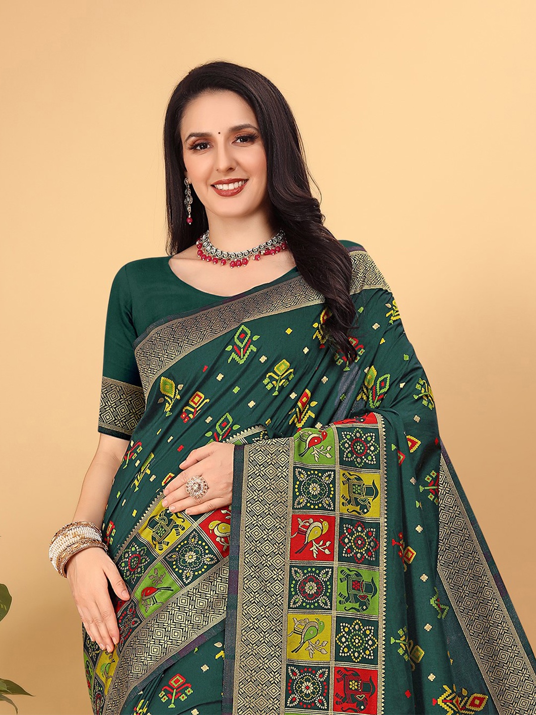 

Pionex Ethnic Motifs Woven Design Zari Pure Silk Patola Saree, Green