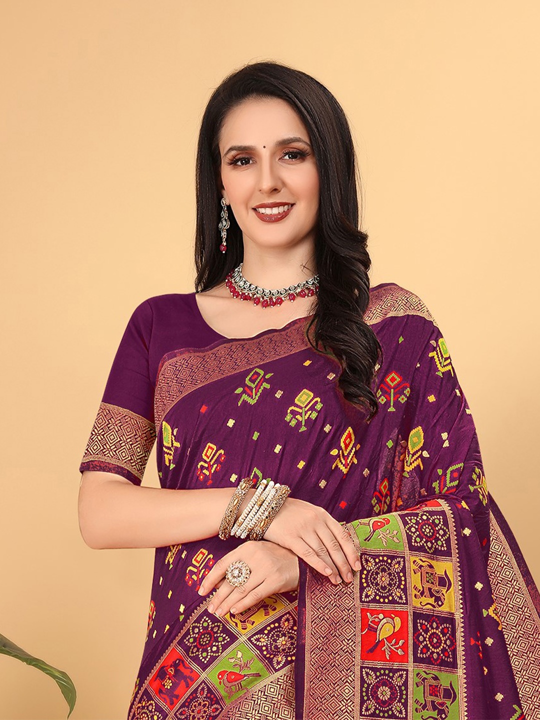 

Pionex Ethnic Motifs Woven Design Zari Pure Silk Patola Saree, Purple