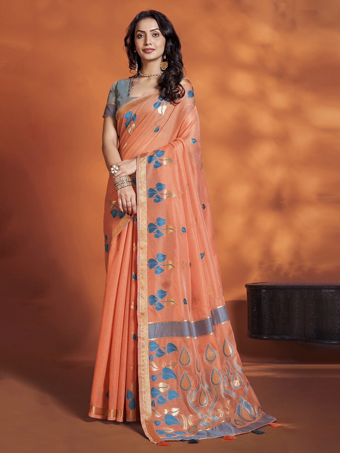 

Mitera Orange Floral Woven Designed Zari Banarasi Saree