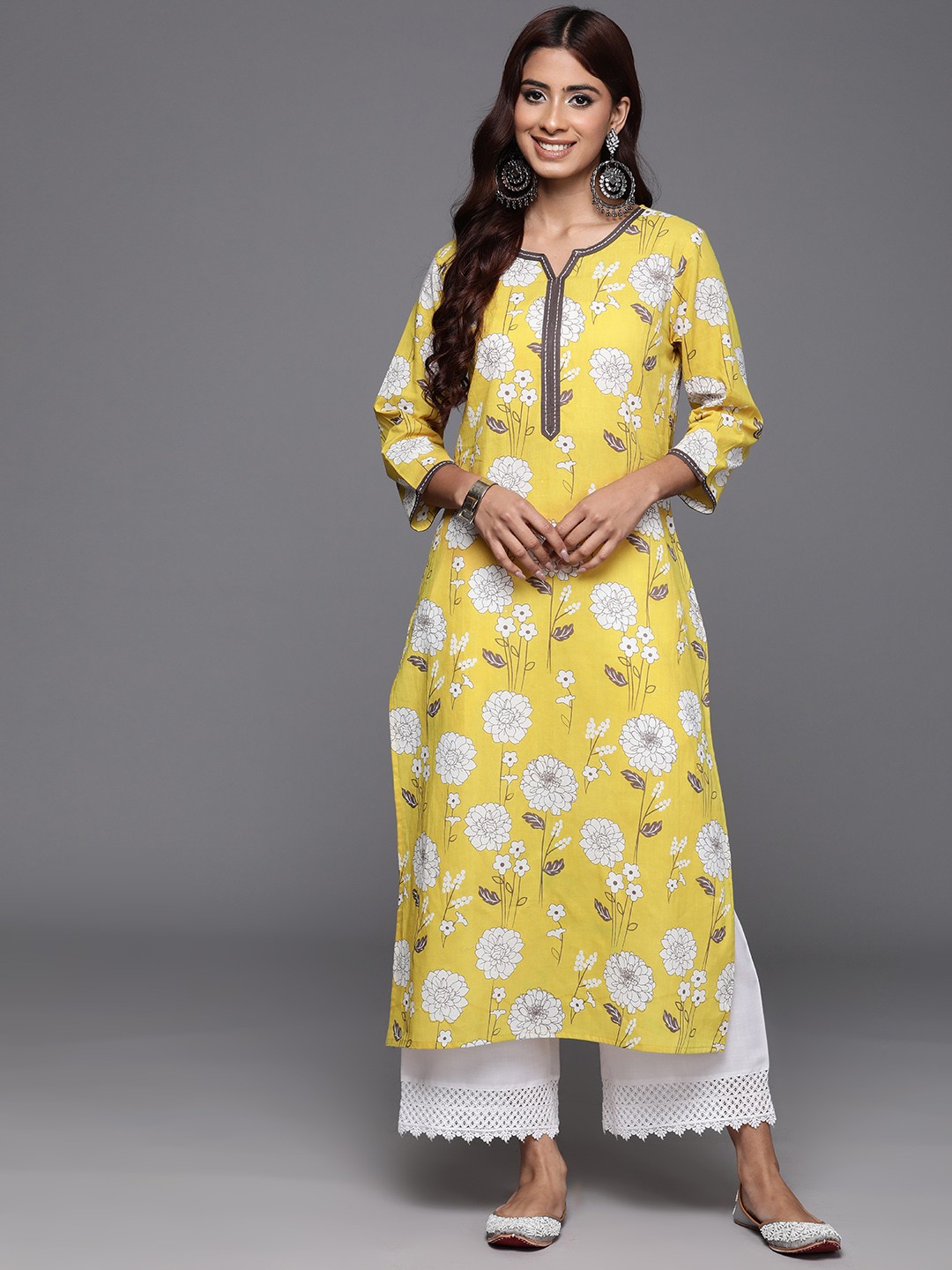 

Varanga Women Floral Printed Thread Work Kurta, Yellow
