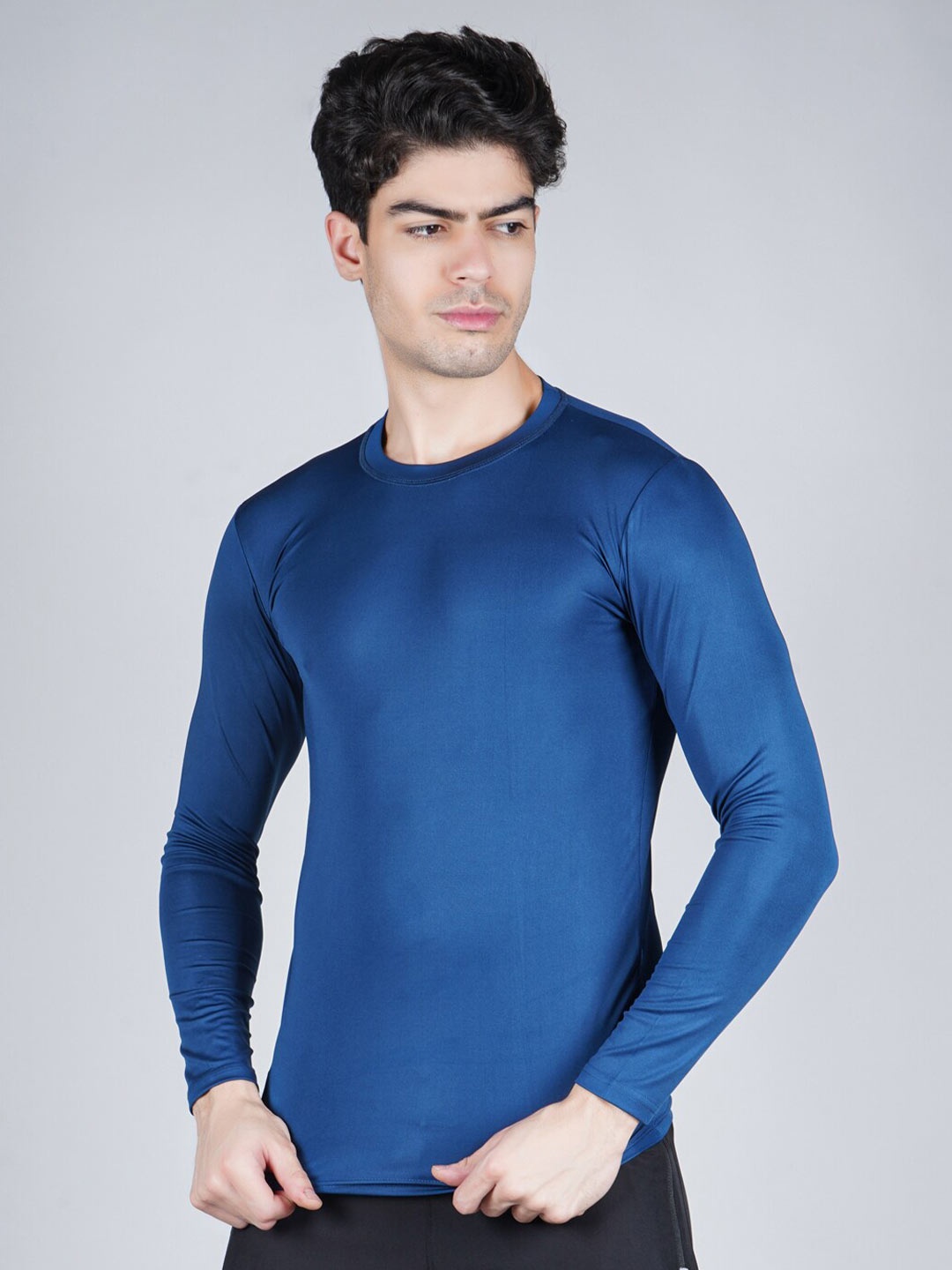 

NEVER LOSE Men Turquoise Blue Compression T-shirt