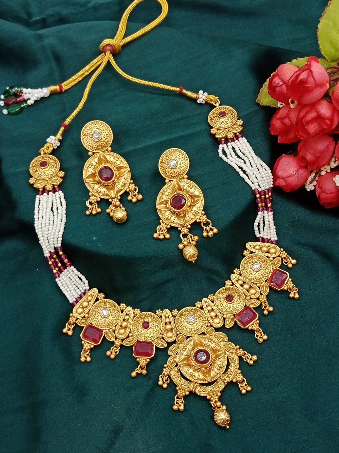 

AASHISH IMITATION Gold-Plated Antique Stone Studded & Pearls Beaded Jewellery Set