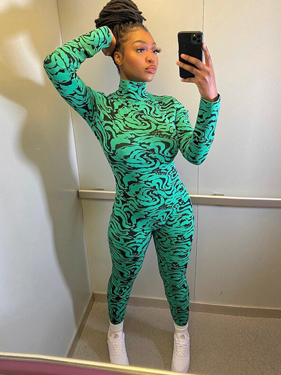 

StyleCast Green High Neck Printed Basic Jumpsuit