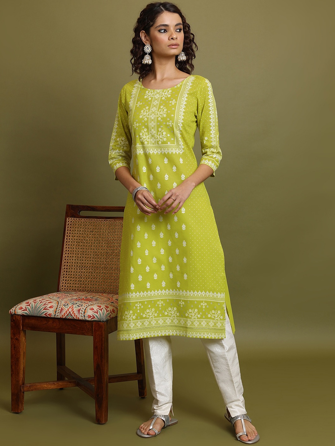 

Vishudh Lime Green Floral Printed Three-Quarter Sleeves Cotton Straight Kurta