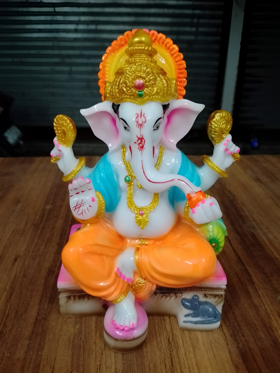 

VAMIKA HANDICRAFTS White & Orange Religious Medium Idol Showpiece