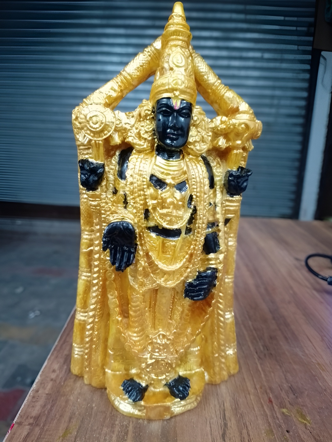 

VAMIKA HANDICRAFTS Gold Toned & Black Religious Idol Showpiece