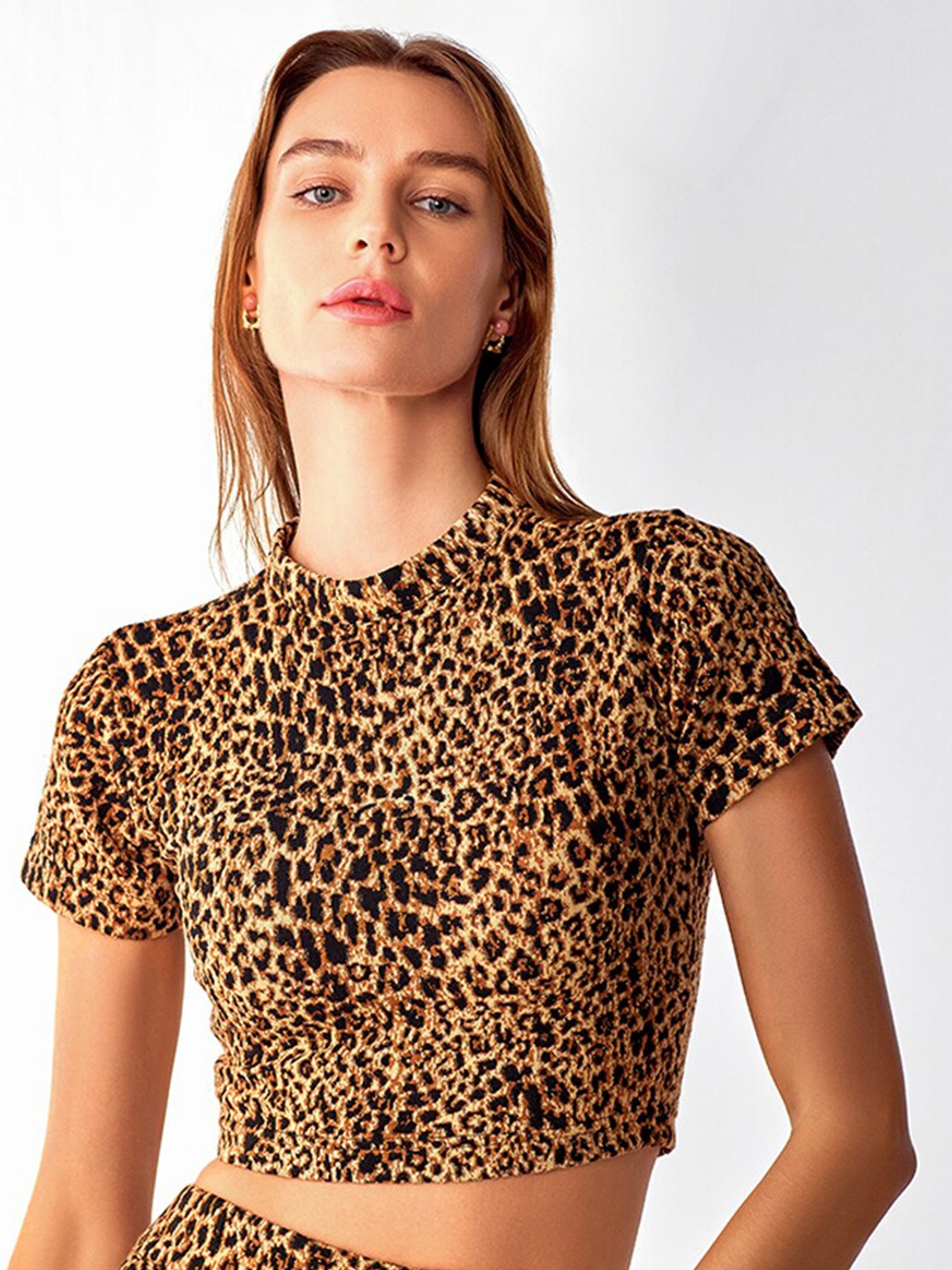 

COVER STORY Brown Abstract Printed Crop Top