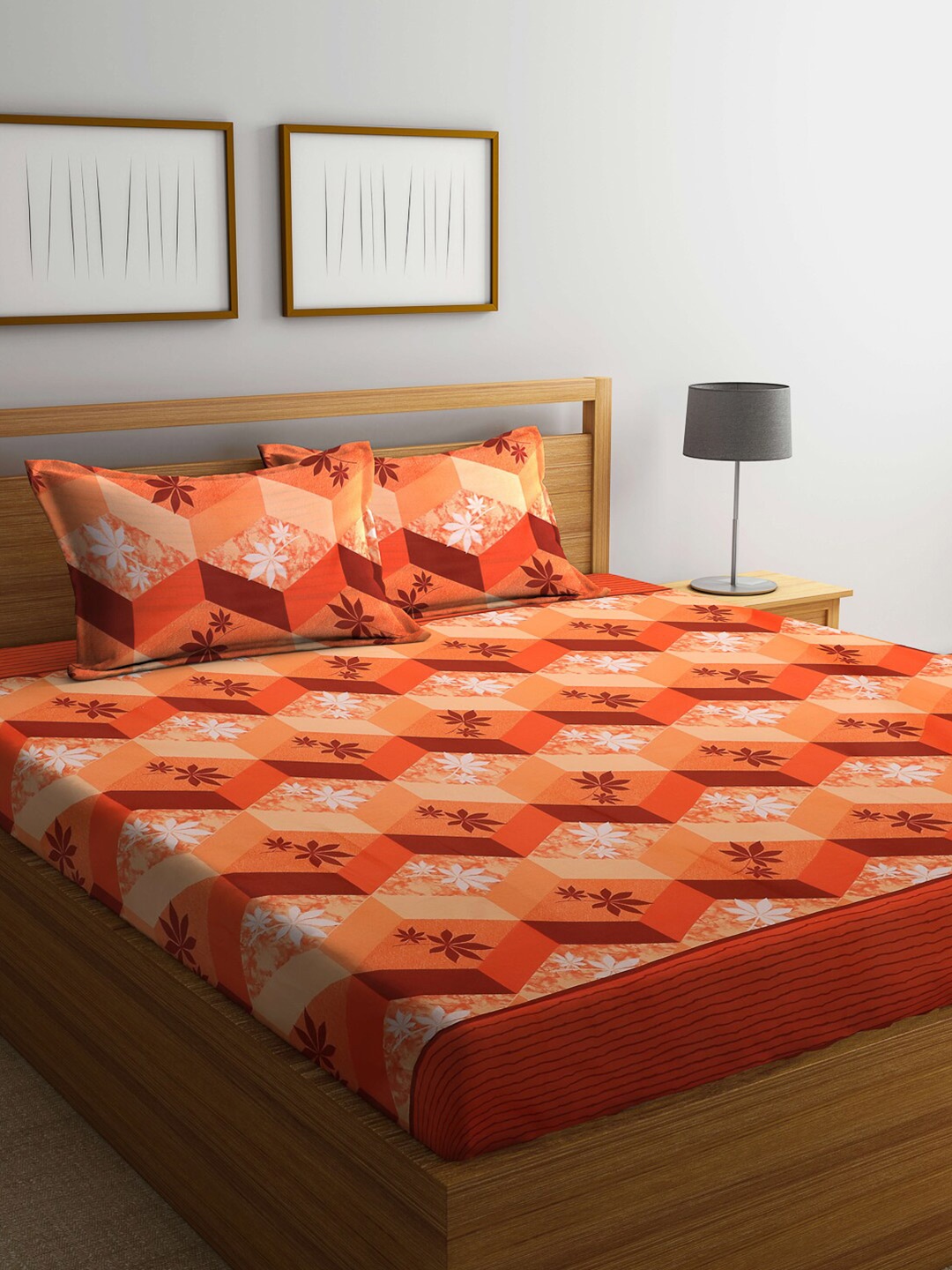 

Dhrohar Orange & Brown Geometric Cotton 240 TC Queen Bedsheet with 2 Pillow Covers