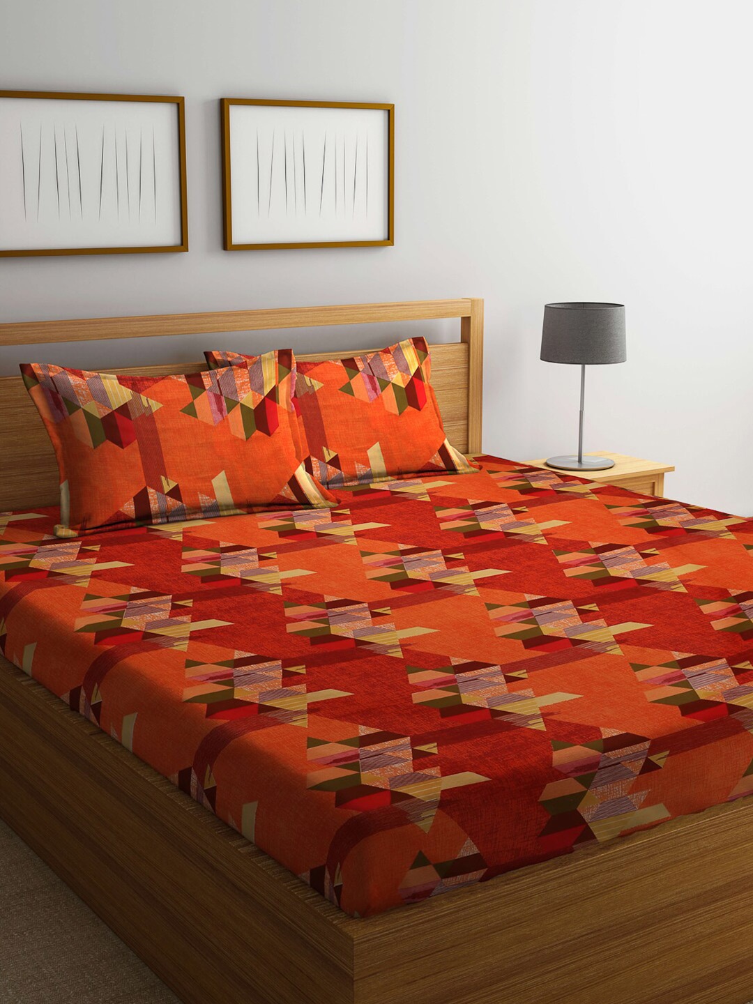 

Dhrohar Red & Orange Geometric Cotton 240 TC Queen Bedsheet with 2 Pillow Covers