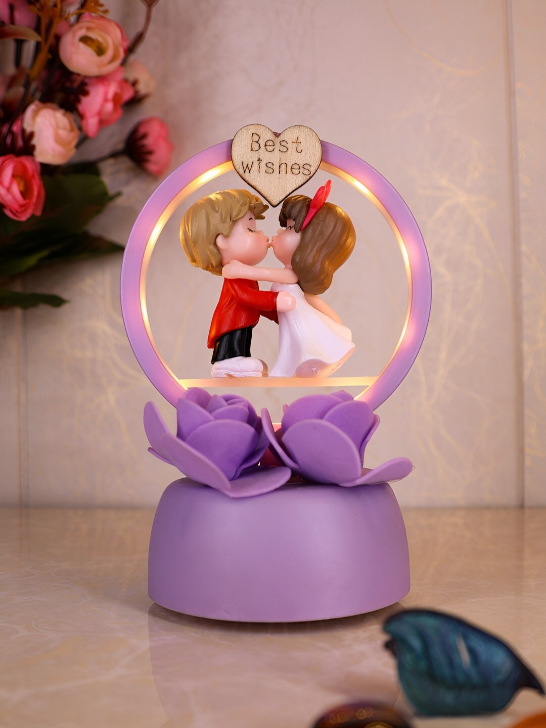 

Elegant Lifestyle Purple & Red Polyresin Figurine Showpiece