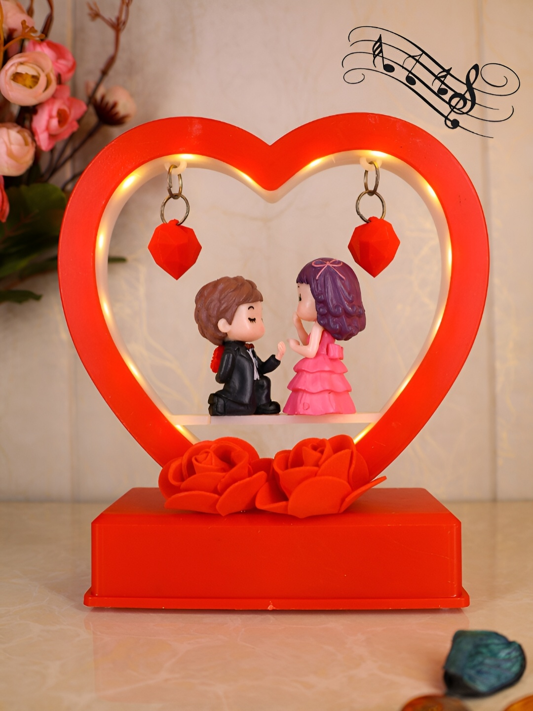 

Elegant Lifestyle Red & Black Polyresin Figurine Showpiece