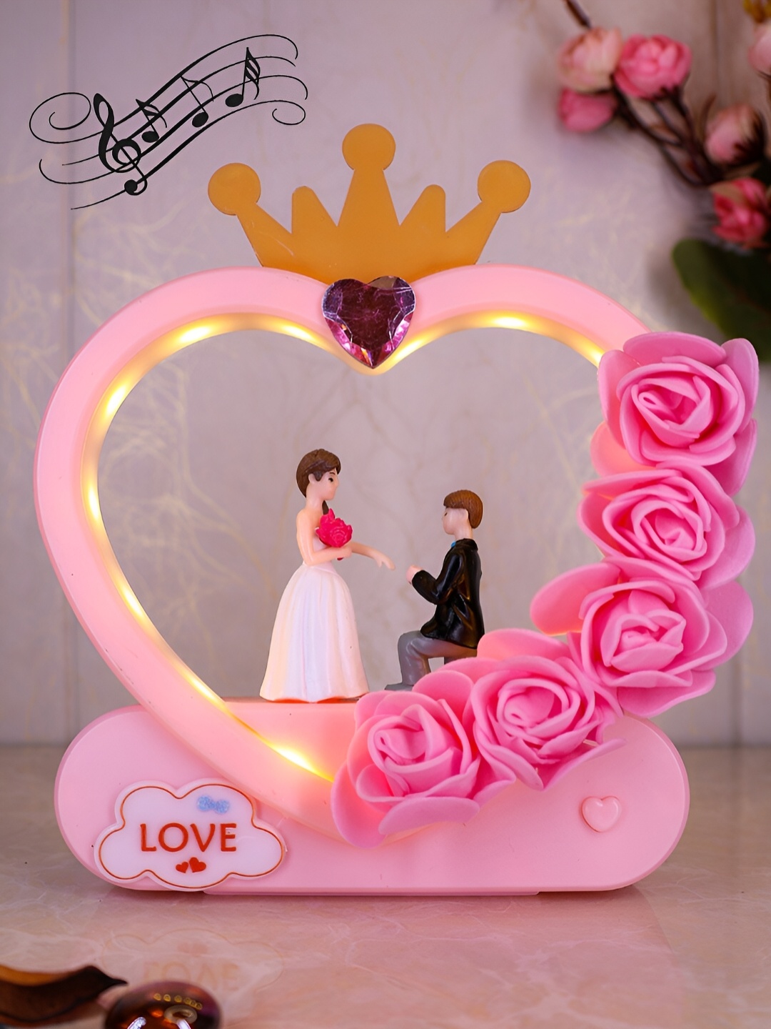 

Elegant Lifestyle Pink Heart Shaped Couples Figurine Showpiece