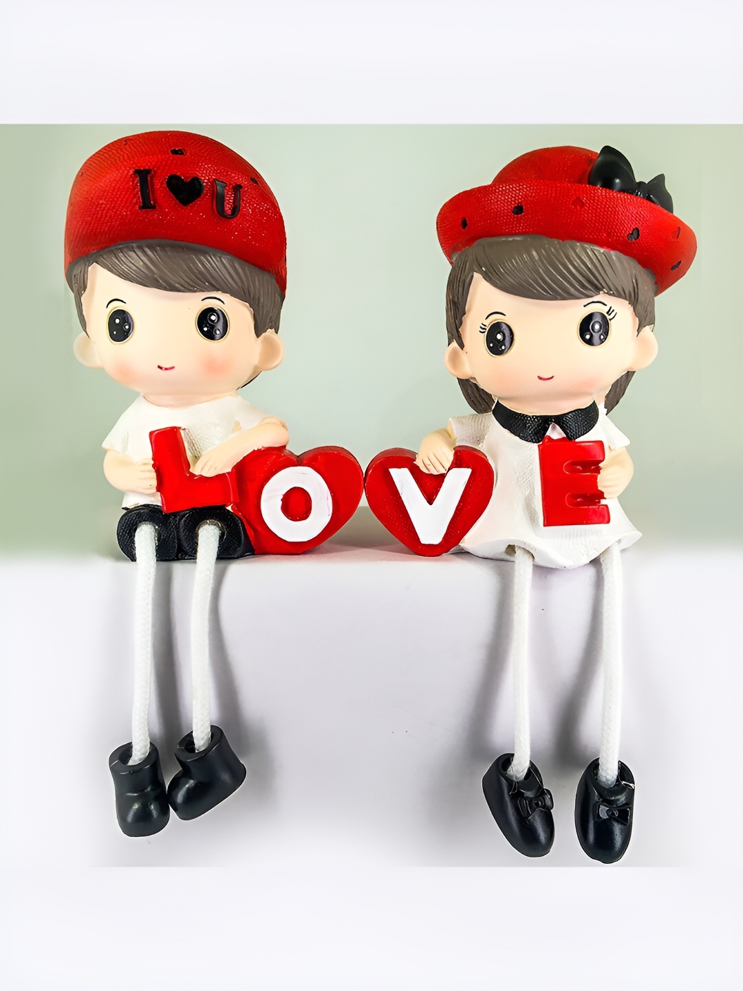

Elegant Lifestyle White & Red Polyresin Figurine Showpiece