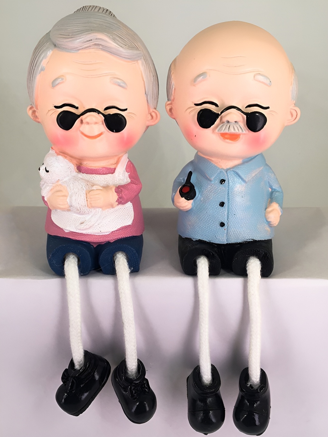 

Elegant Lifestyle Pink & Blue Polyresin Figurine Showpiece