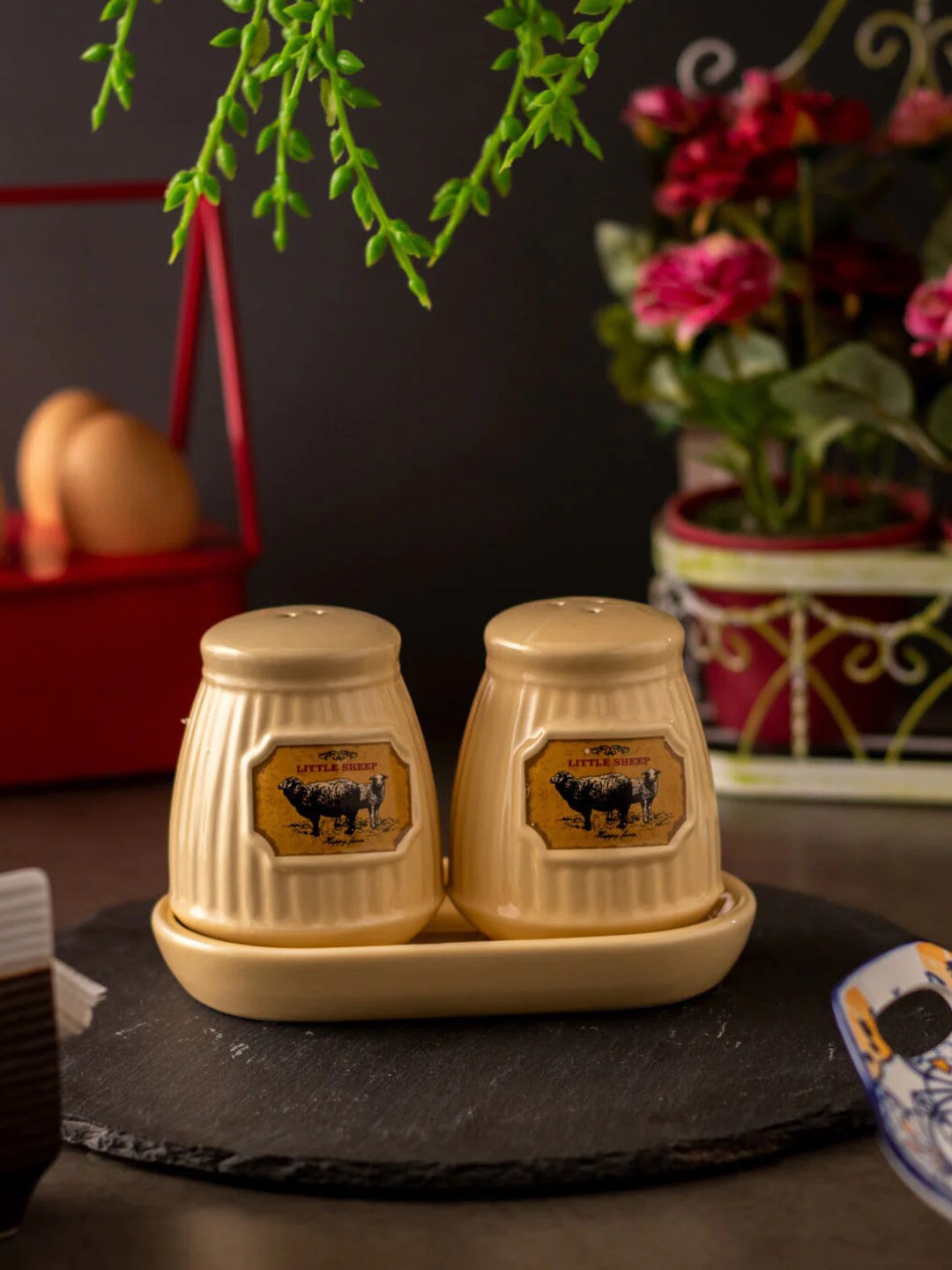 

THEDECORKART Cream Coloured & Black Salt and Pepper Shakers