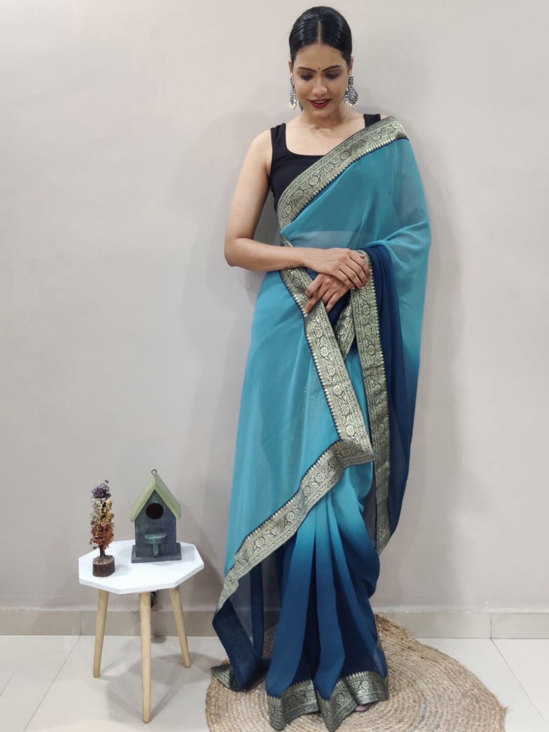 

Satrani Turquoise Blue Ombre Zari Saree