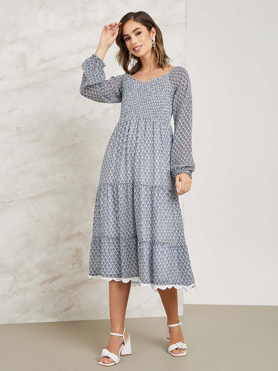 

Styli Blue Ethnic Motifs Printed Smocked Tiered A-Line Midi Dress