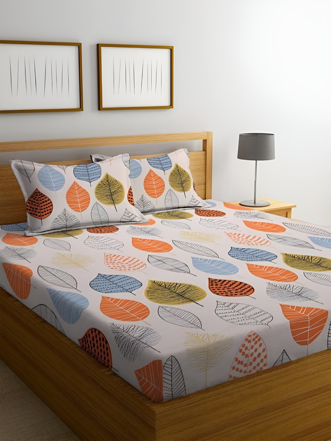 

HOMECRUST Cream Orange Floral 210 TC Queen Fitted Bedsheet With 2 Pillow Covers