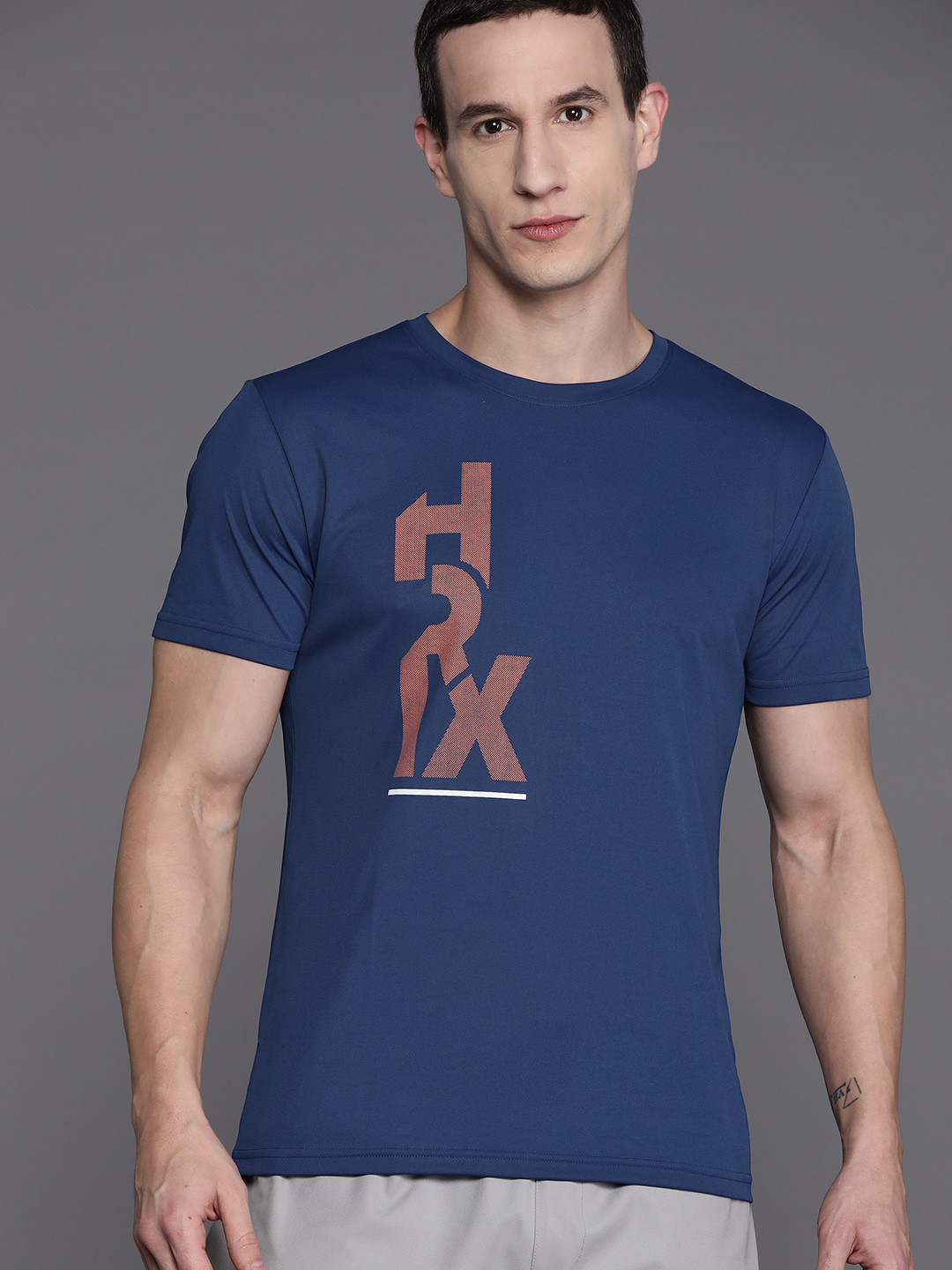 

HRX by Hrithik Roshan Men Brand Logo Printed Sports T-shirt, Blue
