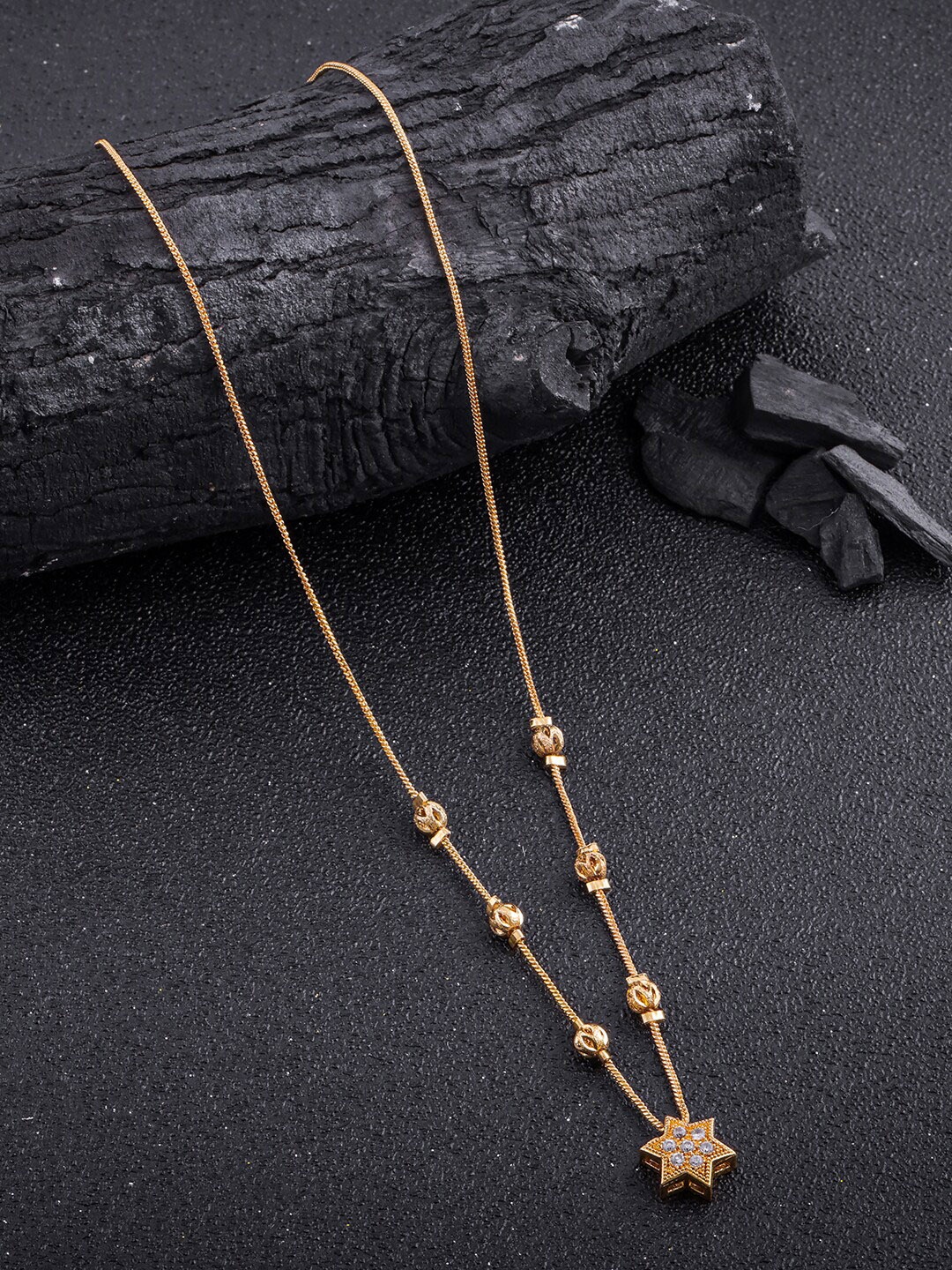 

Anouk Gold Plated Stone Studded & Pearls Beaded Star Design Mangalsutra