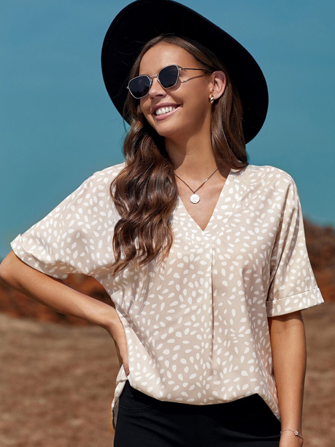 

StyleCast Beige Abstract Printed Top