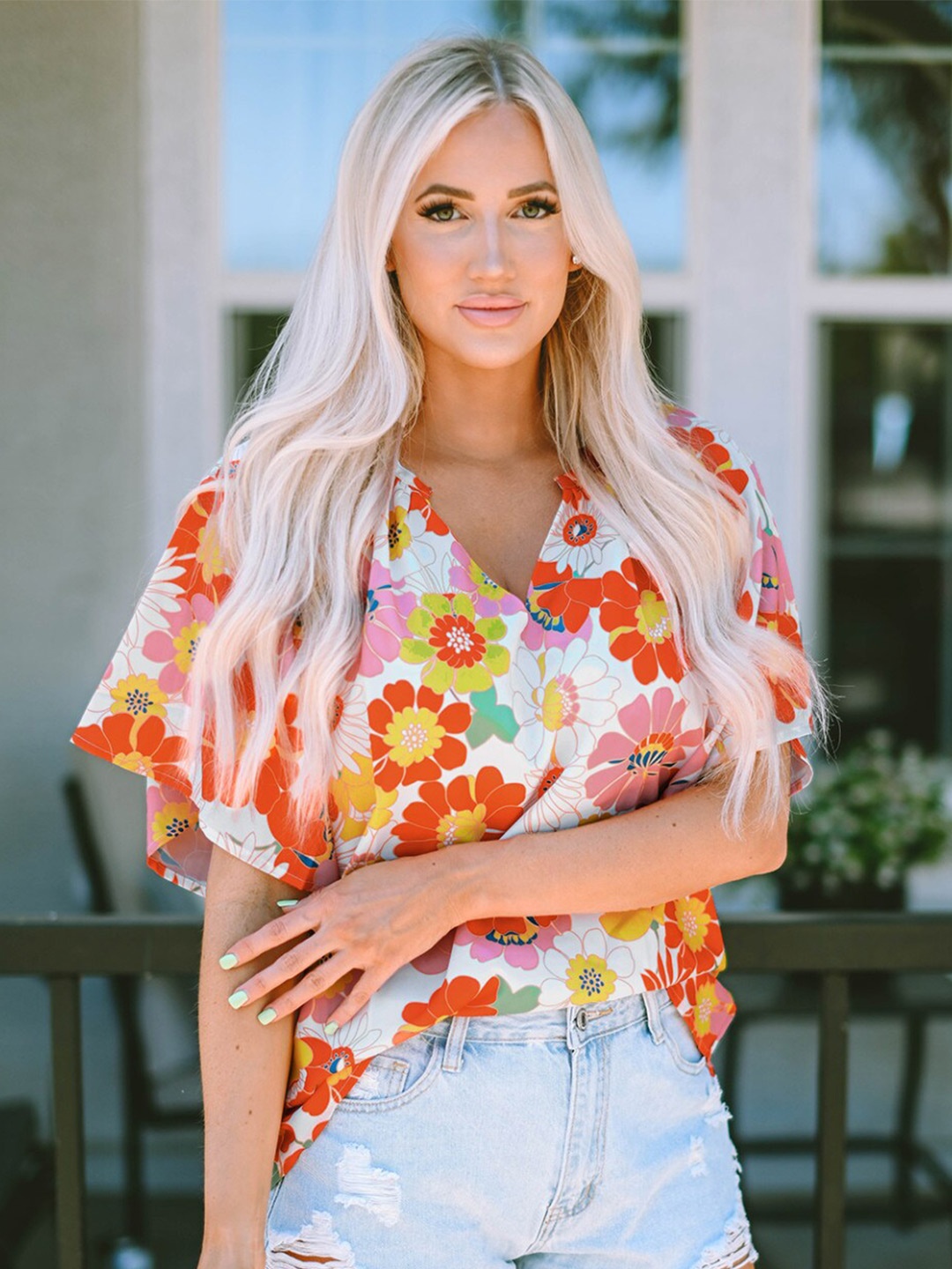 

StyleCast Orange Floral Print Flared Sleeve Top