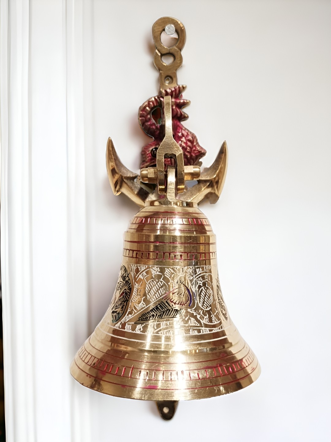 

The Artage Gold Toned Textured Anchor Bell Shaped Brass Wall Hanging