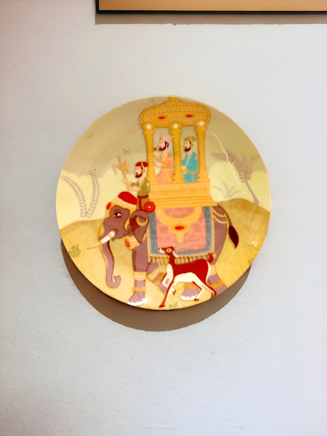 

The Artage Yellow & Brown Printed Elephant Ceramic Wall Plates