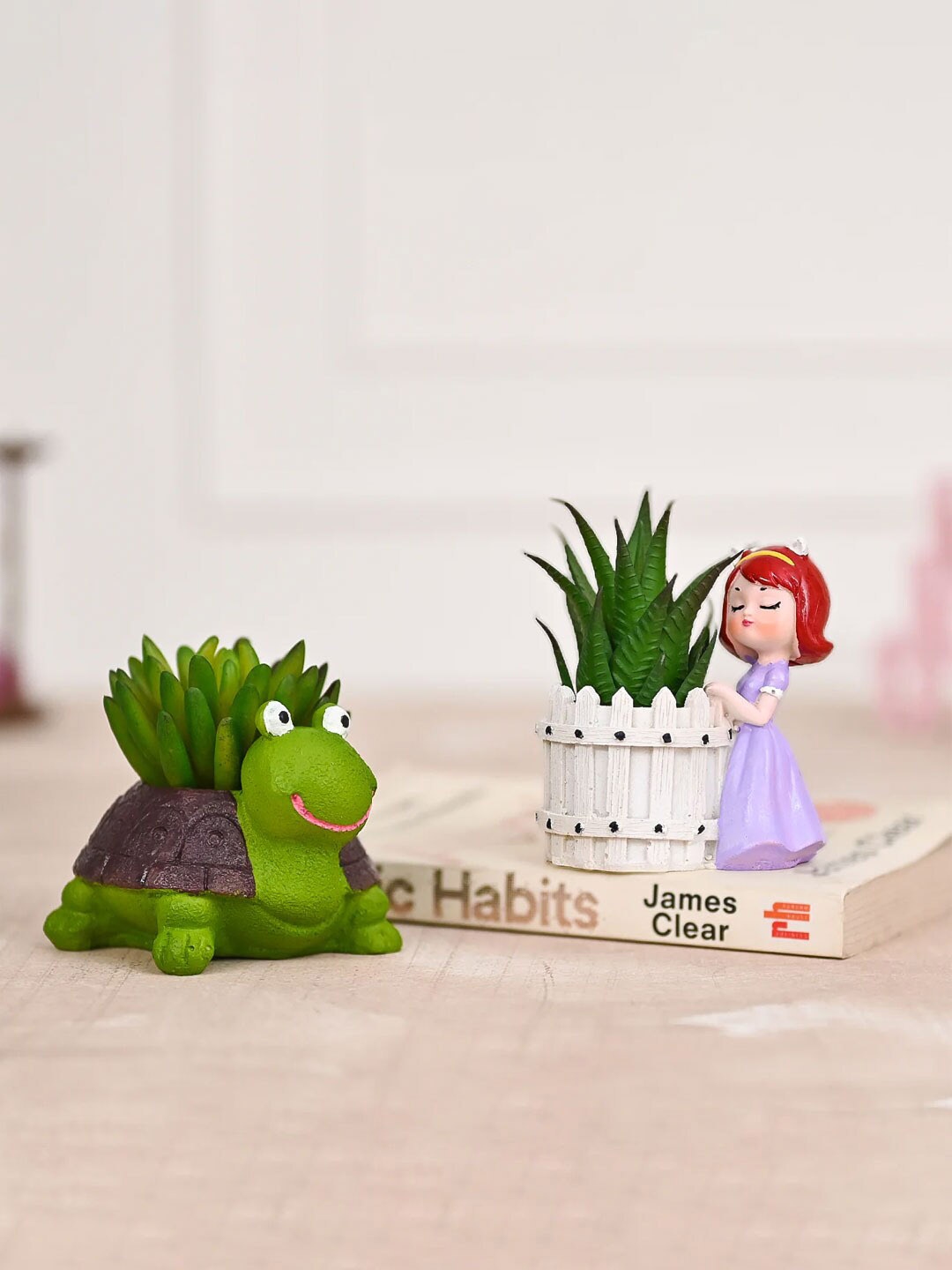 

DecorTwist 2-Pcs Green & Purple Tortoise & Dreaming Girl Shaped Resin Planters