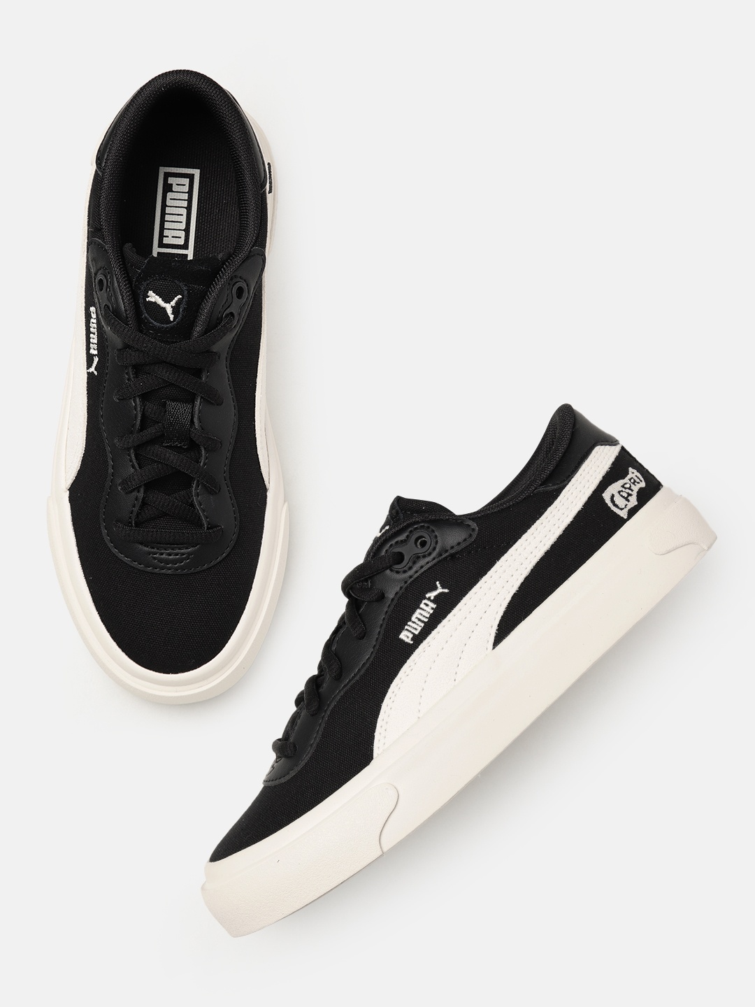 

Puma Unisex Solid Capri Royale Sneakers, Black