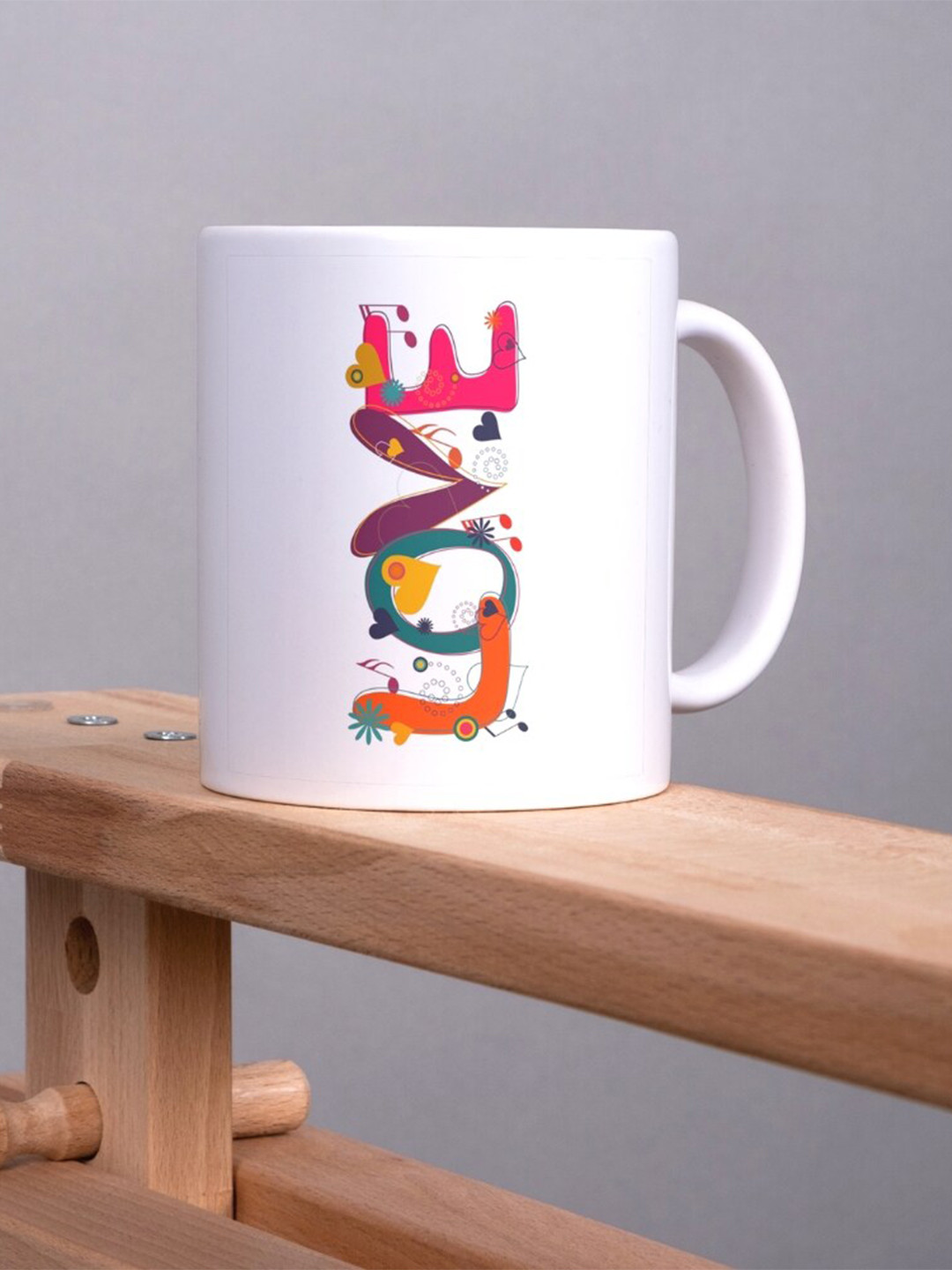 

Home Decor Expert White & White Printed Ceramic Glossy Mugs Set of Cups and Mugs