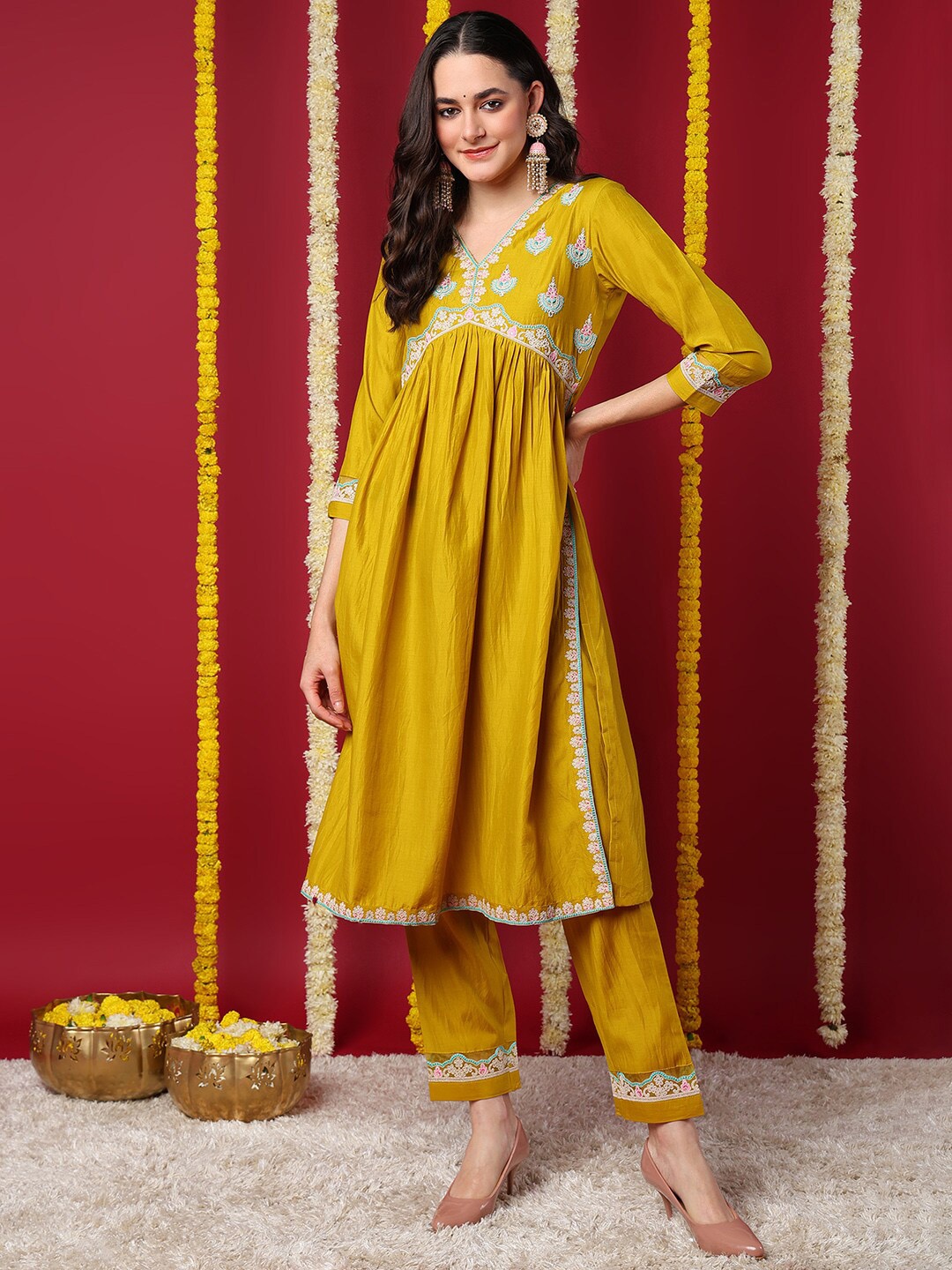 

AHIKA Mustard Yellow Ethnic Motifs Yoke Design Thread Work A-Line Kurta with Trouser