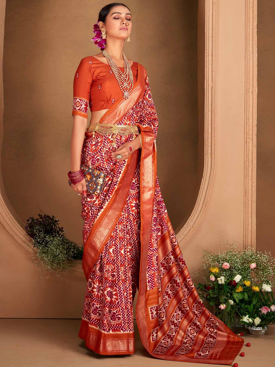 

Saree mall Ethnic Motifs Printed Zari Ikat Sarees, Orange