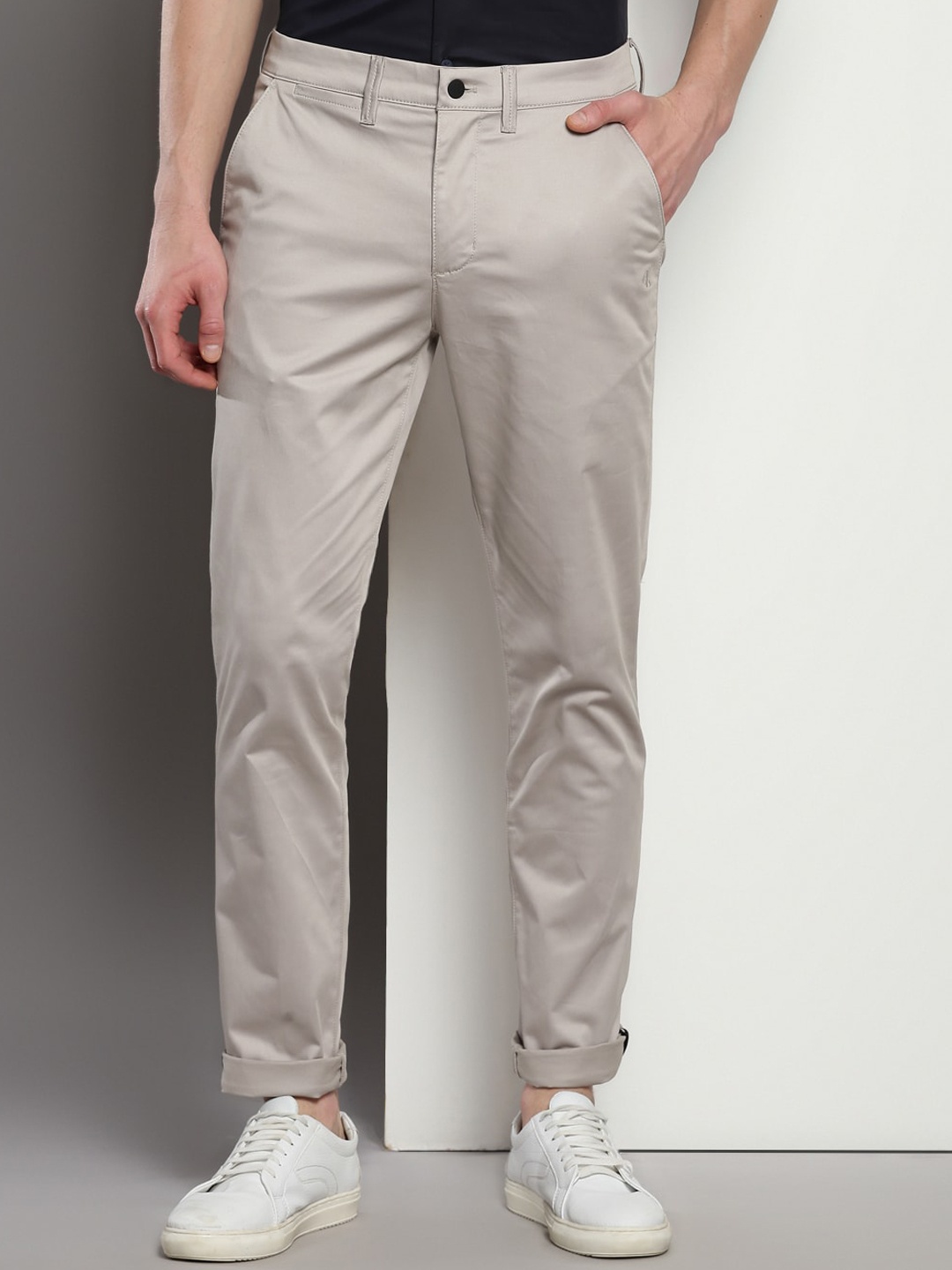 

Calvin Klein Men Mid-Rise Slim Fit Organic Cotton Chinos Trousers, Beige