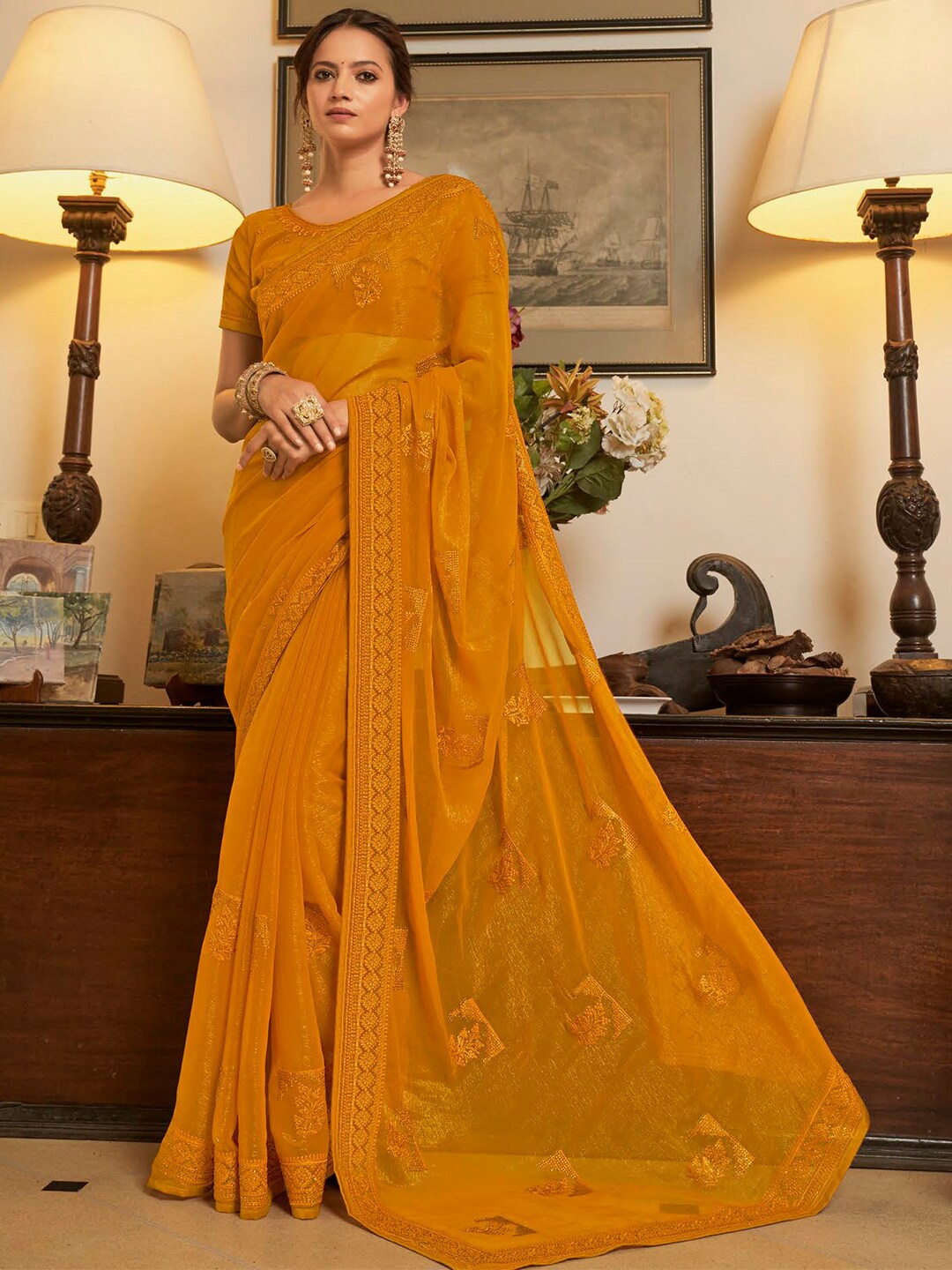 

Mitera Mustard Yellow Embroidered Pure Chiffon Designer Saree