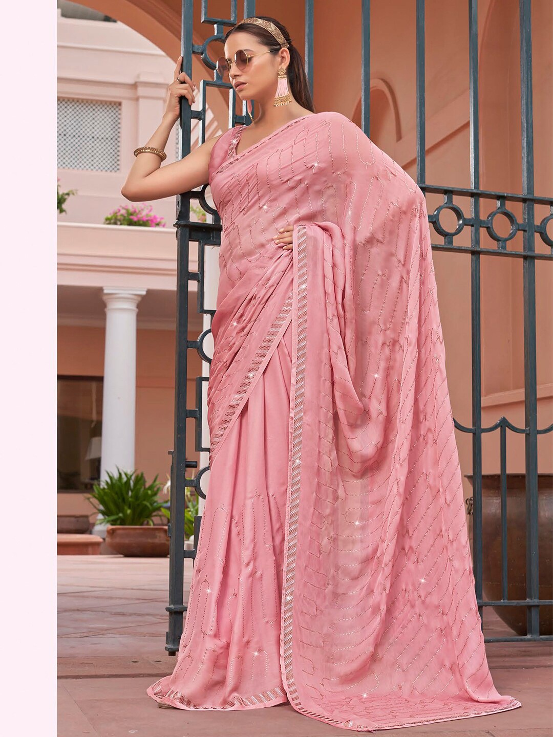 

Mitera Peach & Gold Toned Embellished Beads and Stones Satin Chiffon Saree