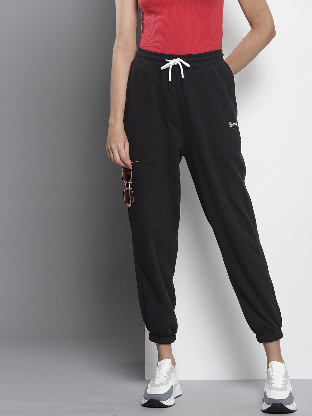

Tommy Hilfiger Women Solid Relaxed Fit Mid-Rise Knitted Joggers With Brand Logo Embroidery, Black