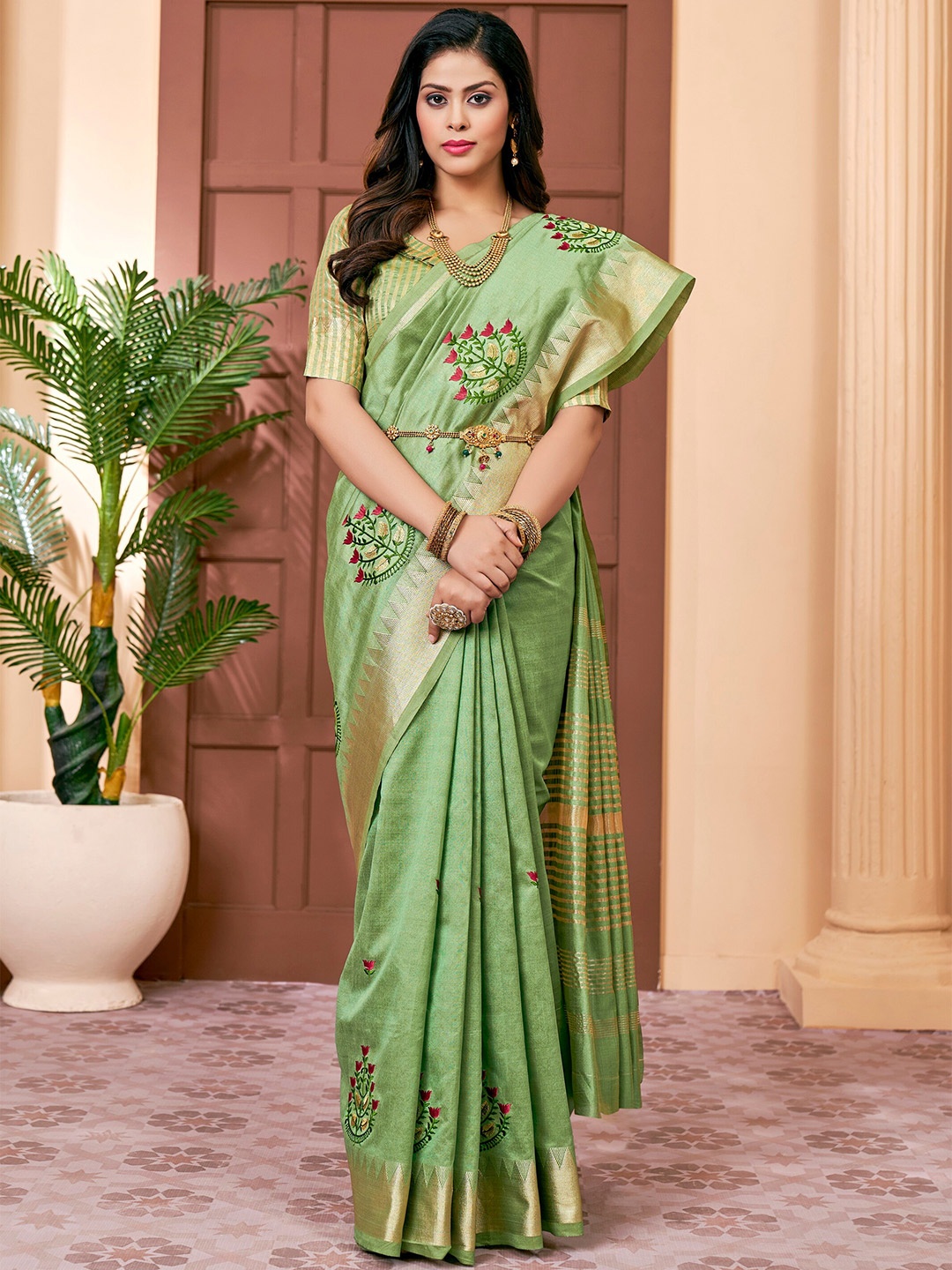 

Mitera Green & Red Floral Embroidered Assam Silk Cotton Banarasi Saree