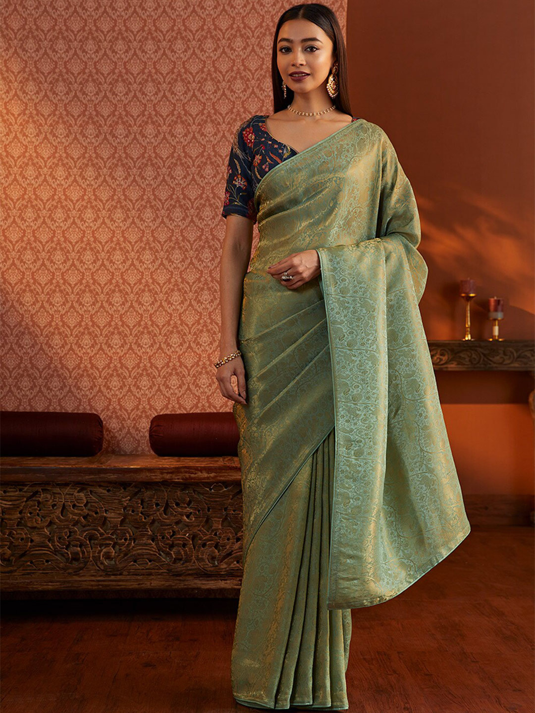 

Taneira Green Ethnic Motifs Woven Design Zari Saree