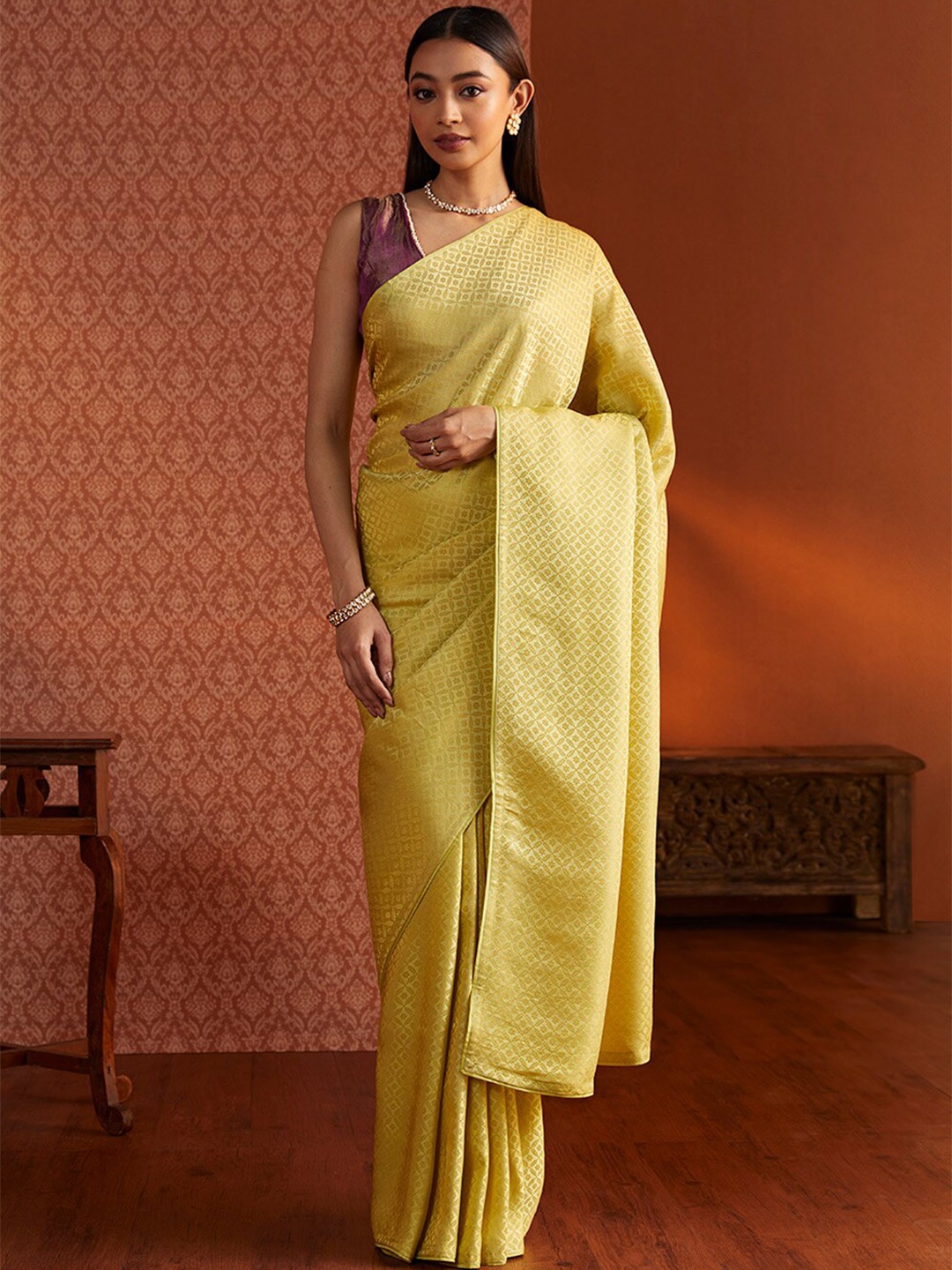 

Taneira Ethnic Motifs Woven Design Zari Saree, Yellow