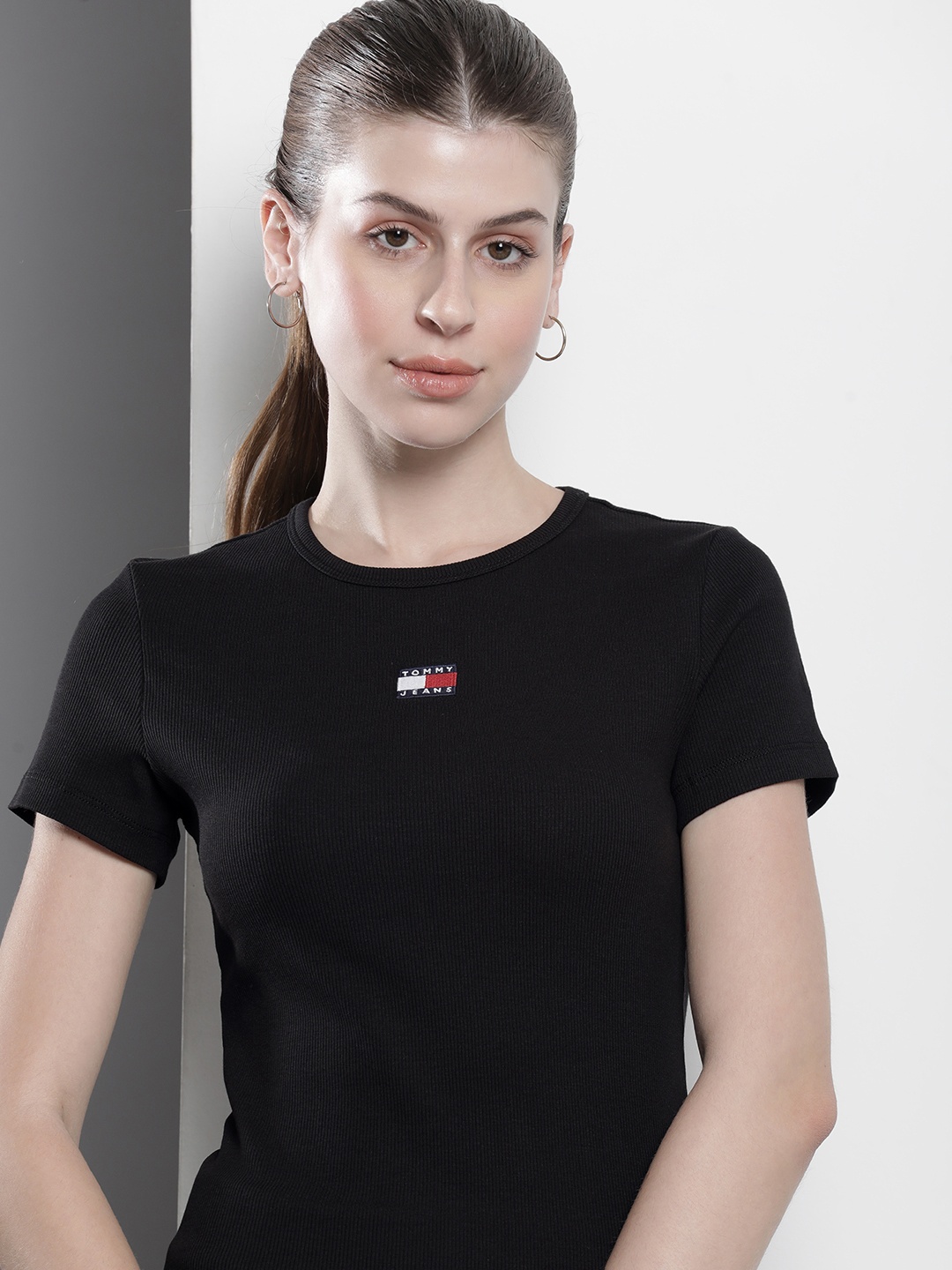 

Tommy Hilfiger Women Self Striped Slim Fit T-shirt, Black