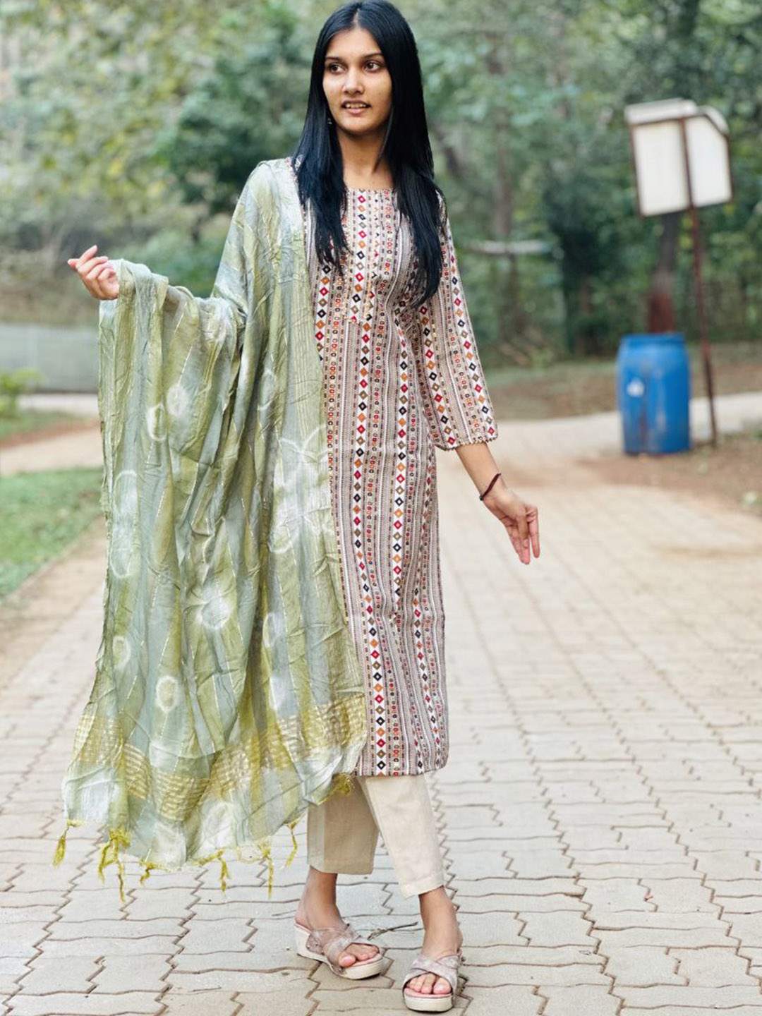 

Twika Women White Printed Regular Kurti with Trousers & With Dupatta