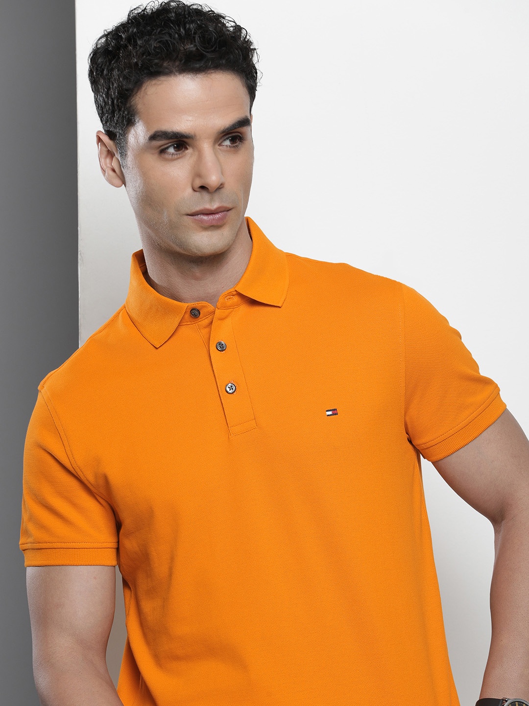 

Tommy Hilfiger Solid Polo Collar Slim Fit T-shirt, Orange