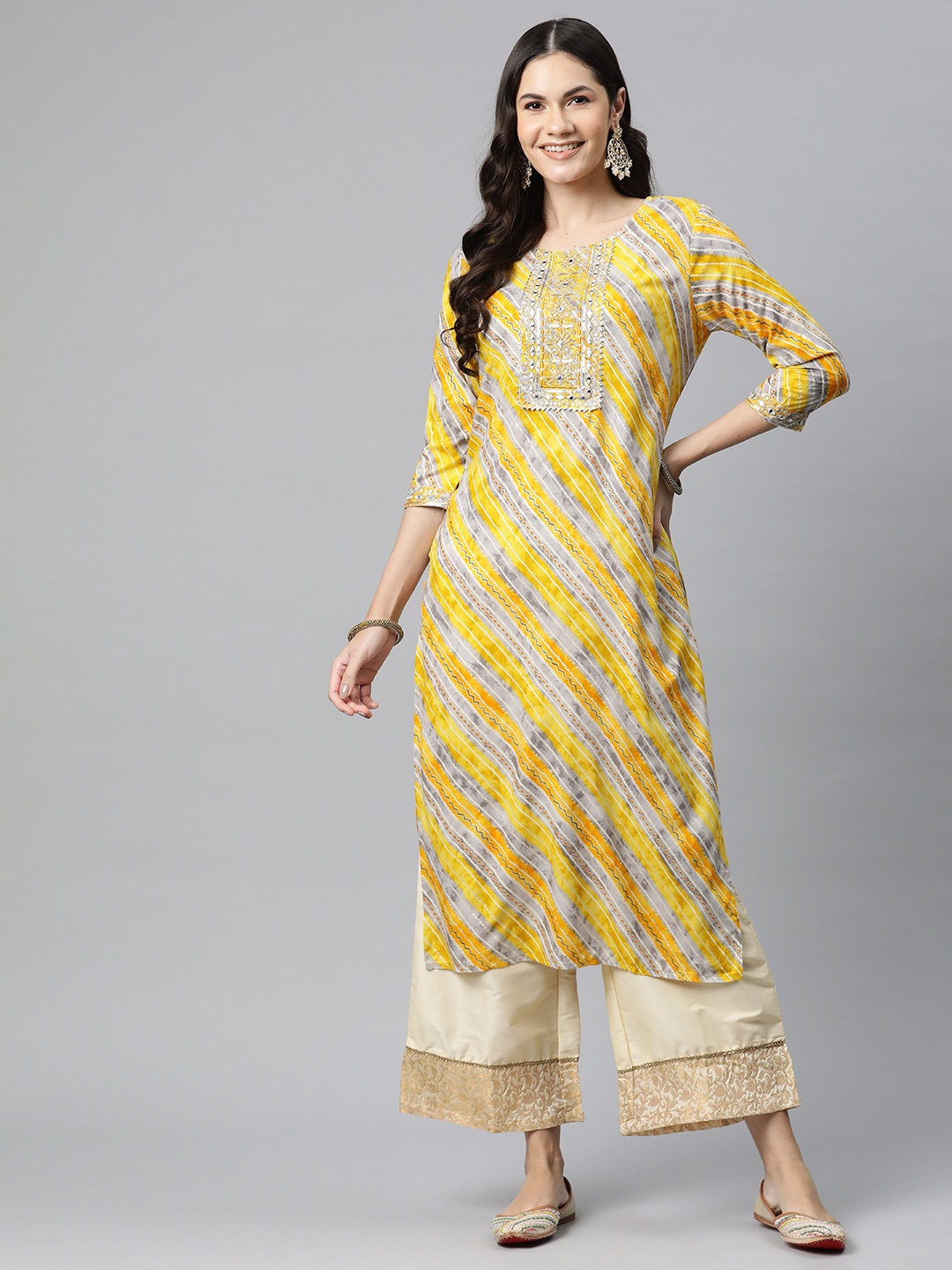 

Readiprint Leheriya Printed Thread Work Kurta, Yellow