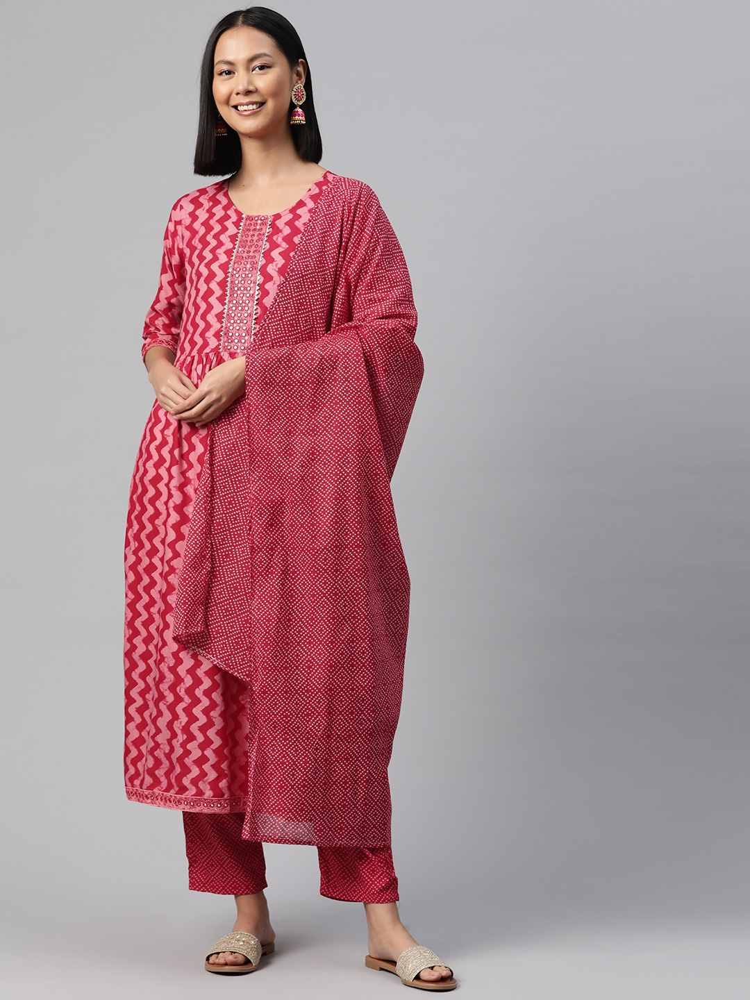 

Readiprint Fashions Abstract Printed Mirror Work Kurta with Trousers & Dupatta, Pink