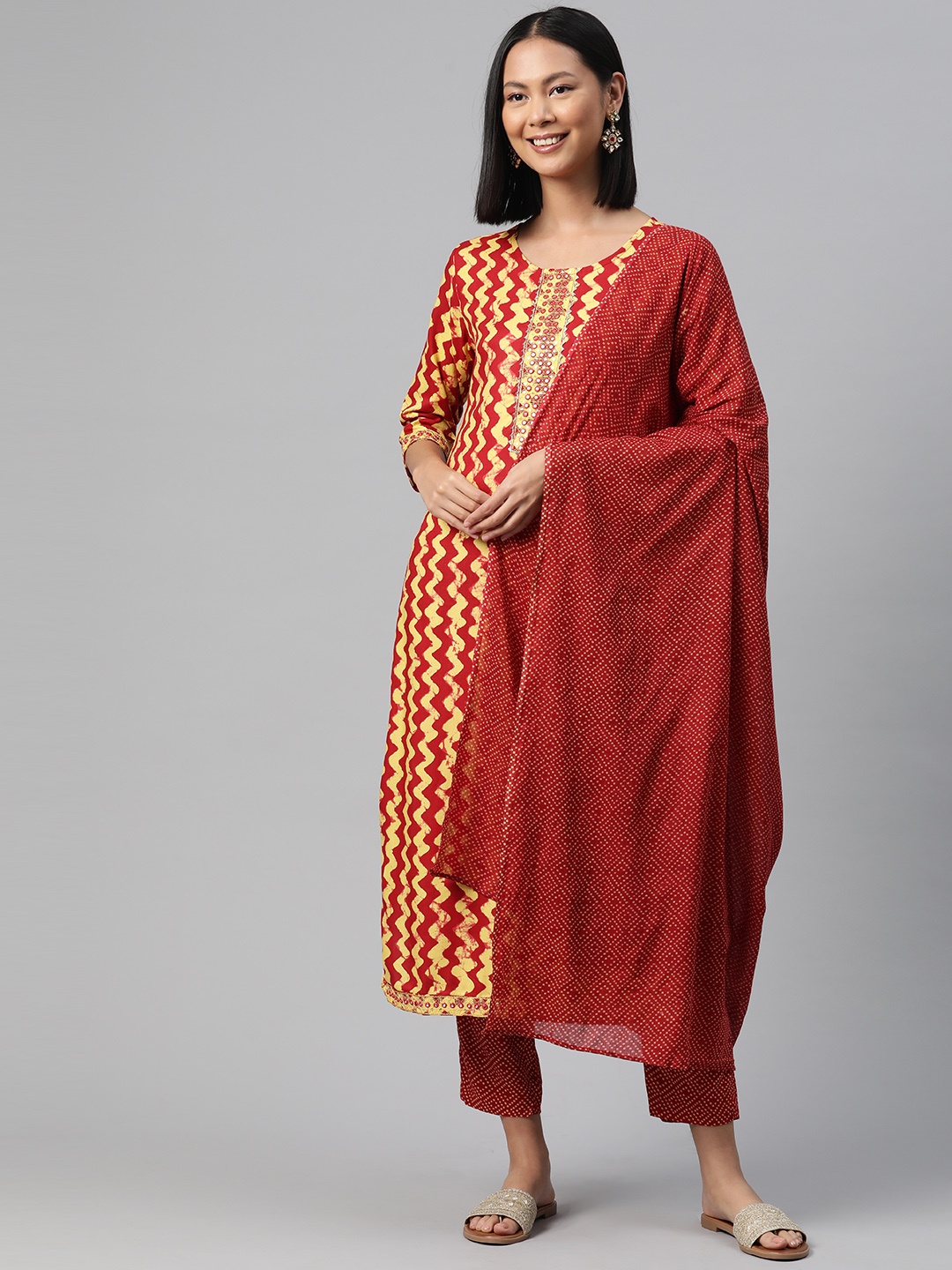 

Readiprint Printed Regular Mirror Work Kurta with Trousers & Dupatta, Red