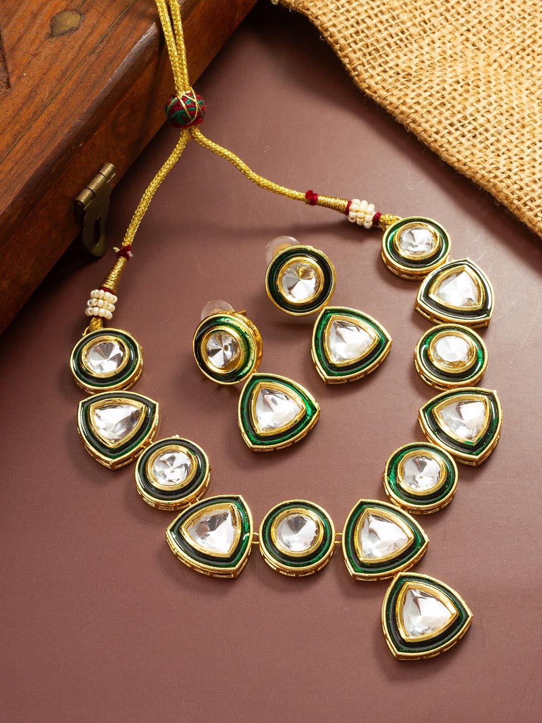 

aadita Gold Plated Kundan Studded Jewellery Set