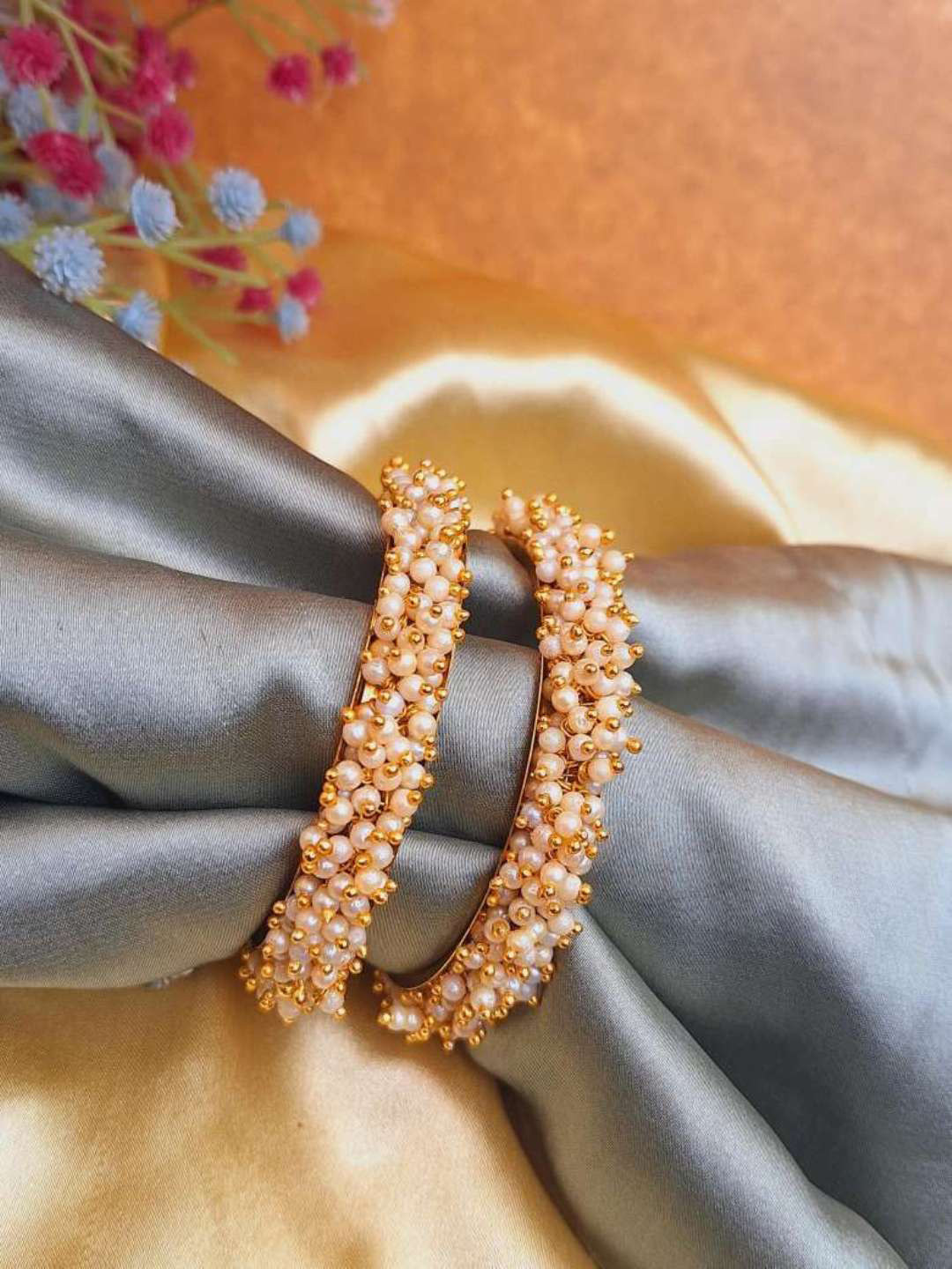 

Crunchy Fashion Set Of 2 Gold Plated Beaded Bangles