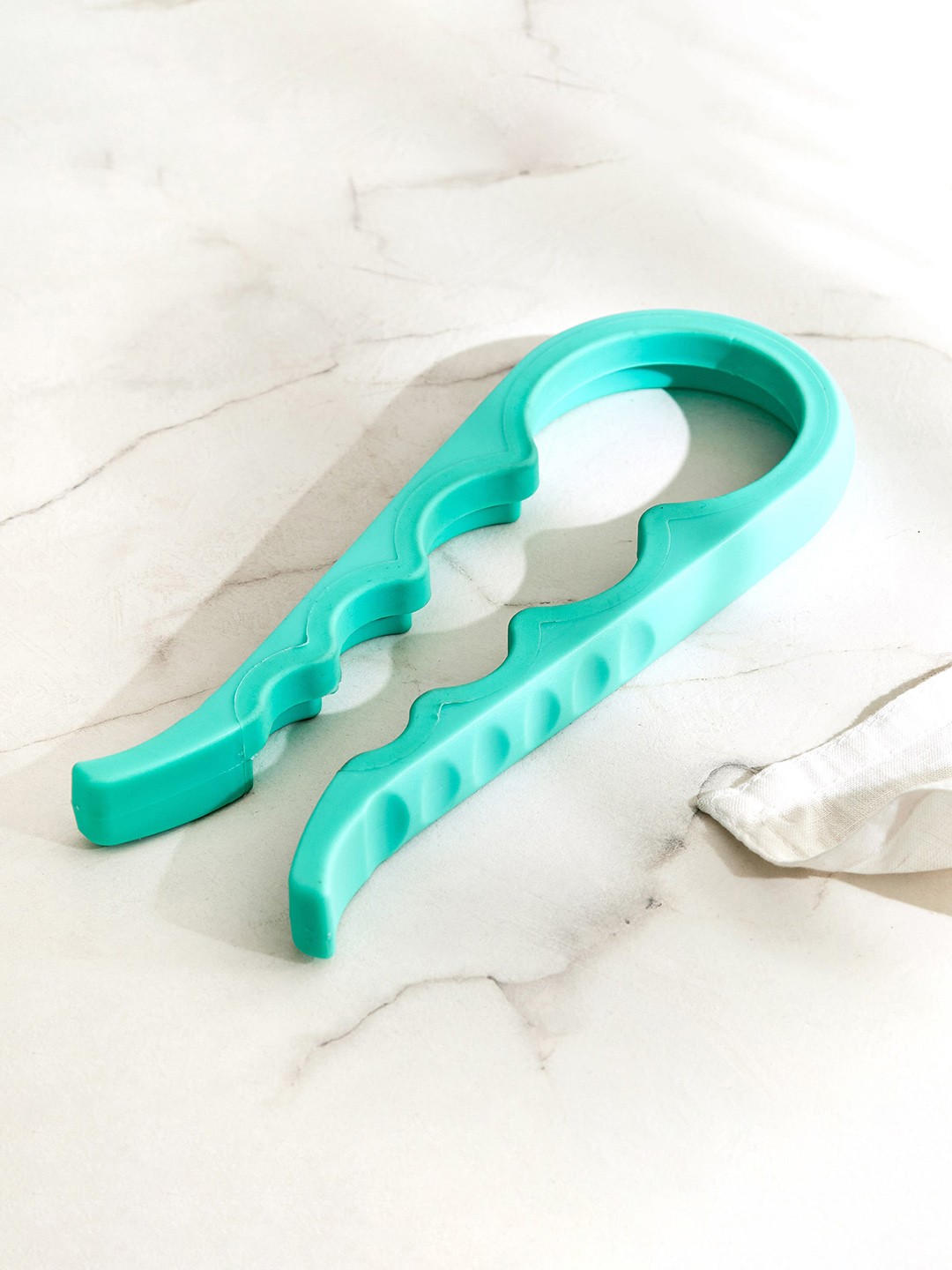 

Home Centre Rosemary Green Bottle Opener