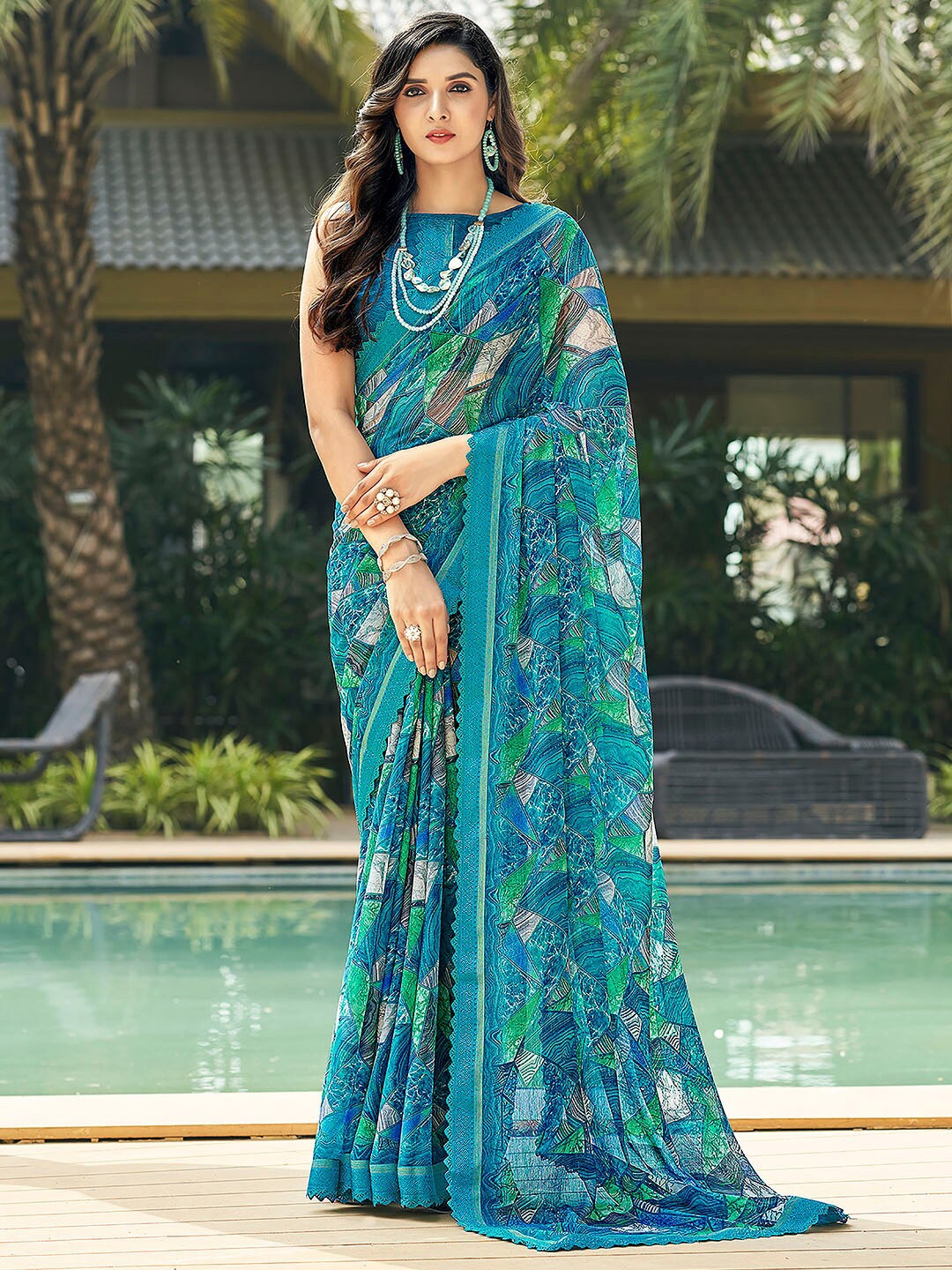 

Anouk Blue Abstract Printed Pure Chiffon Saree